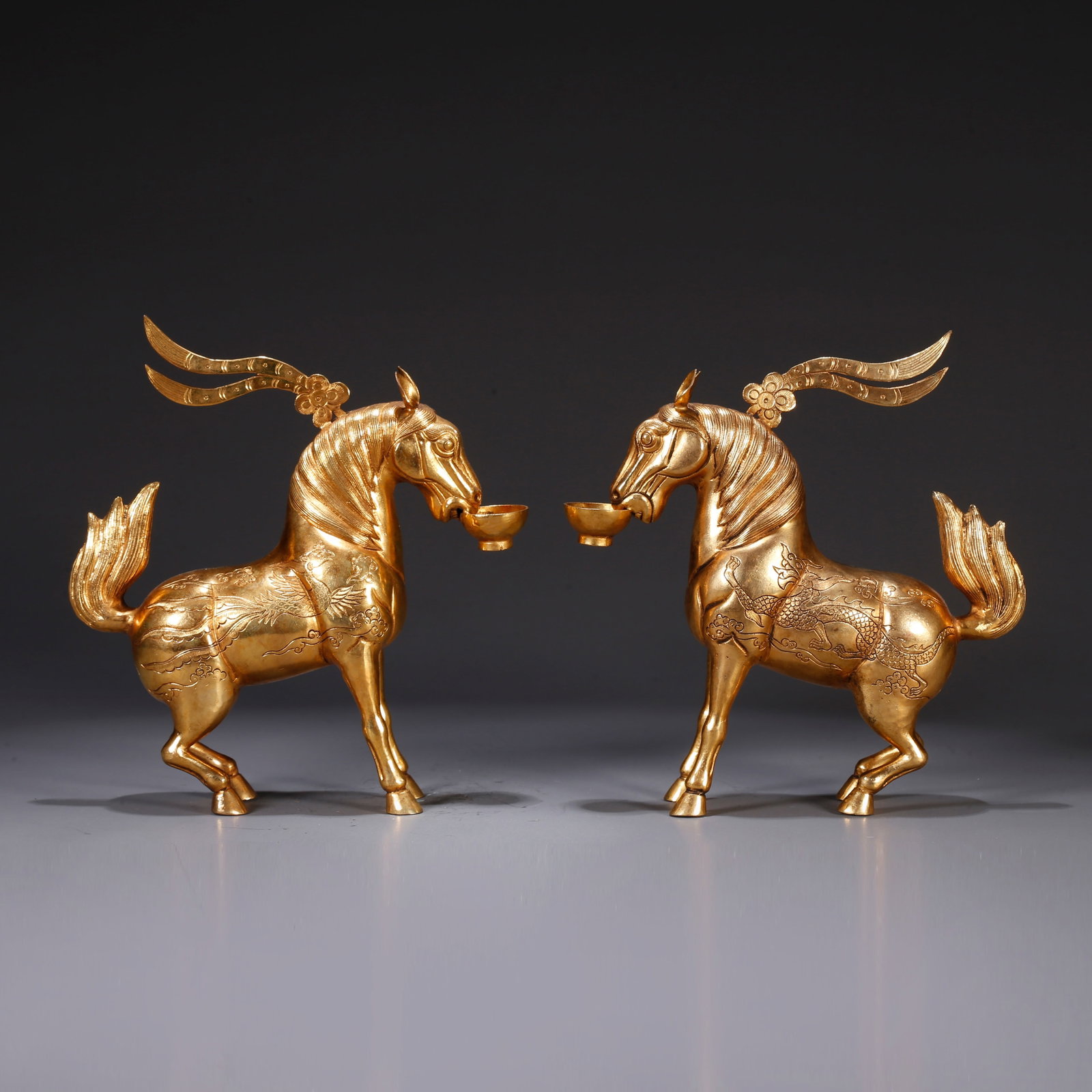 A GILT BRONZE INK DRIPPERS SHAPED LIKE GALLOPING HORSES WITH DRAGON AND PHOENIX MOTIFS (PAIR) (1 of 10)