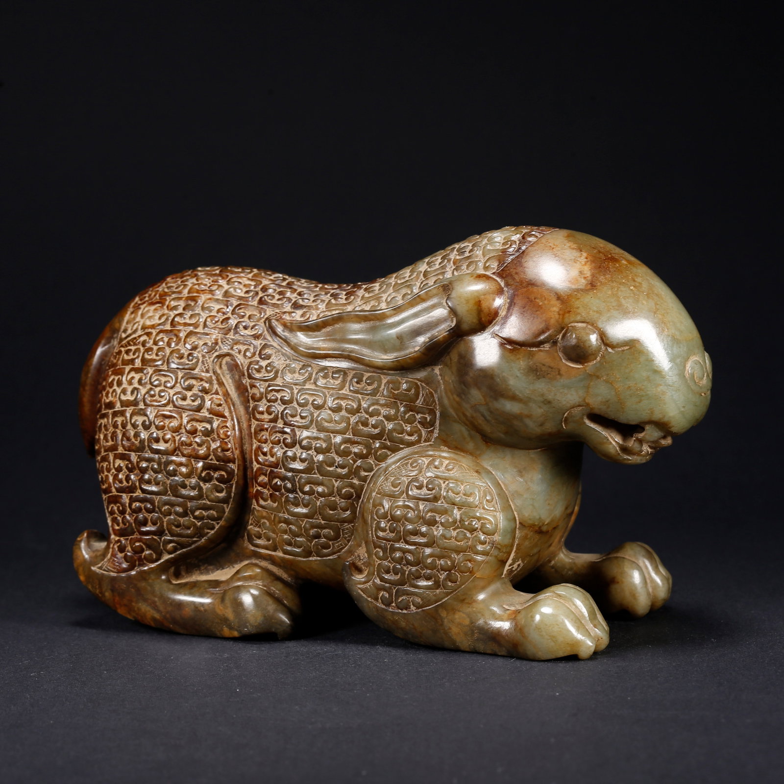 A HETIAN JADE RABBIT-SHAPED FIGURINE: Hetian Jade Rabbit-Shaped Figurine