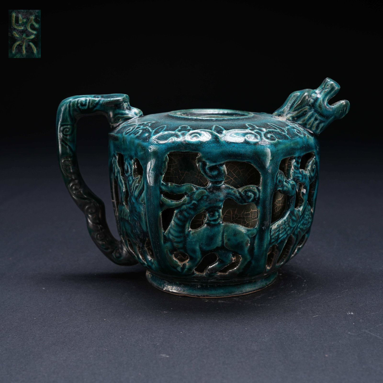 A BLUE GLAZED OPENWORK AUSPICIOUS BEAST PATTERN EWER (1 of 9)