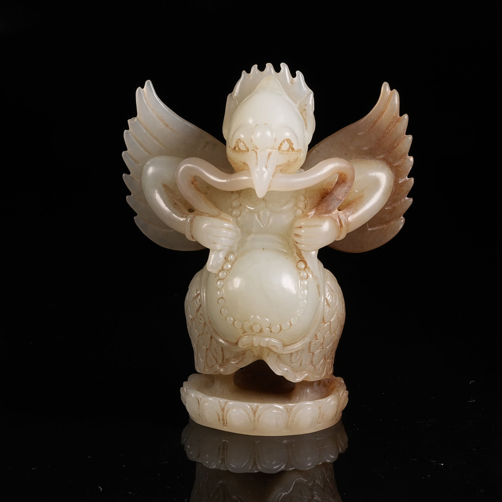 A HETIAN JADE ROC BIRD ORNAMENT: Hetian Jade Roc Bird Ornament