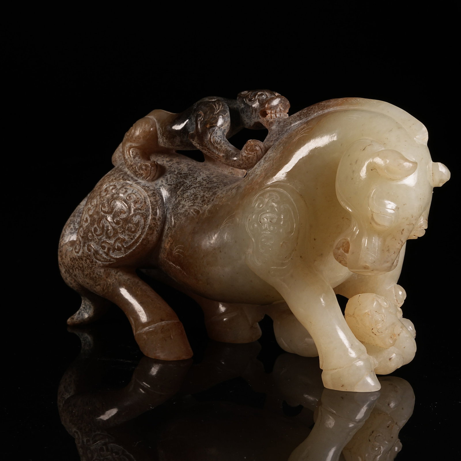 A ANCIENT JADE AUSPICIOUS BEAST ORNAMENT (1 of 8)