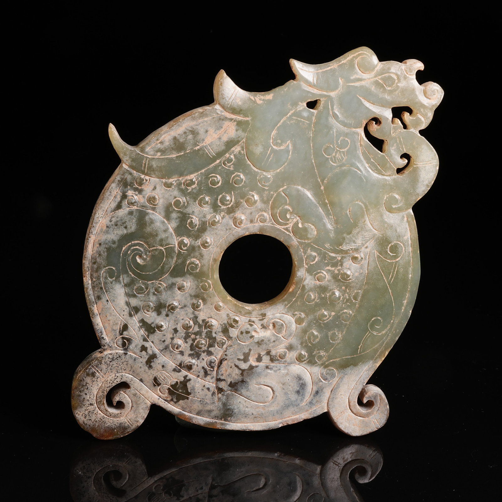 A ANCIENT JADE OUTLINED BI DISC WITH CHILONG PATTERN: Ancient Jade Outlined Bi Disc with Chilong Pattern