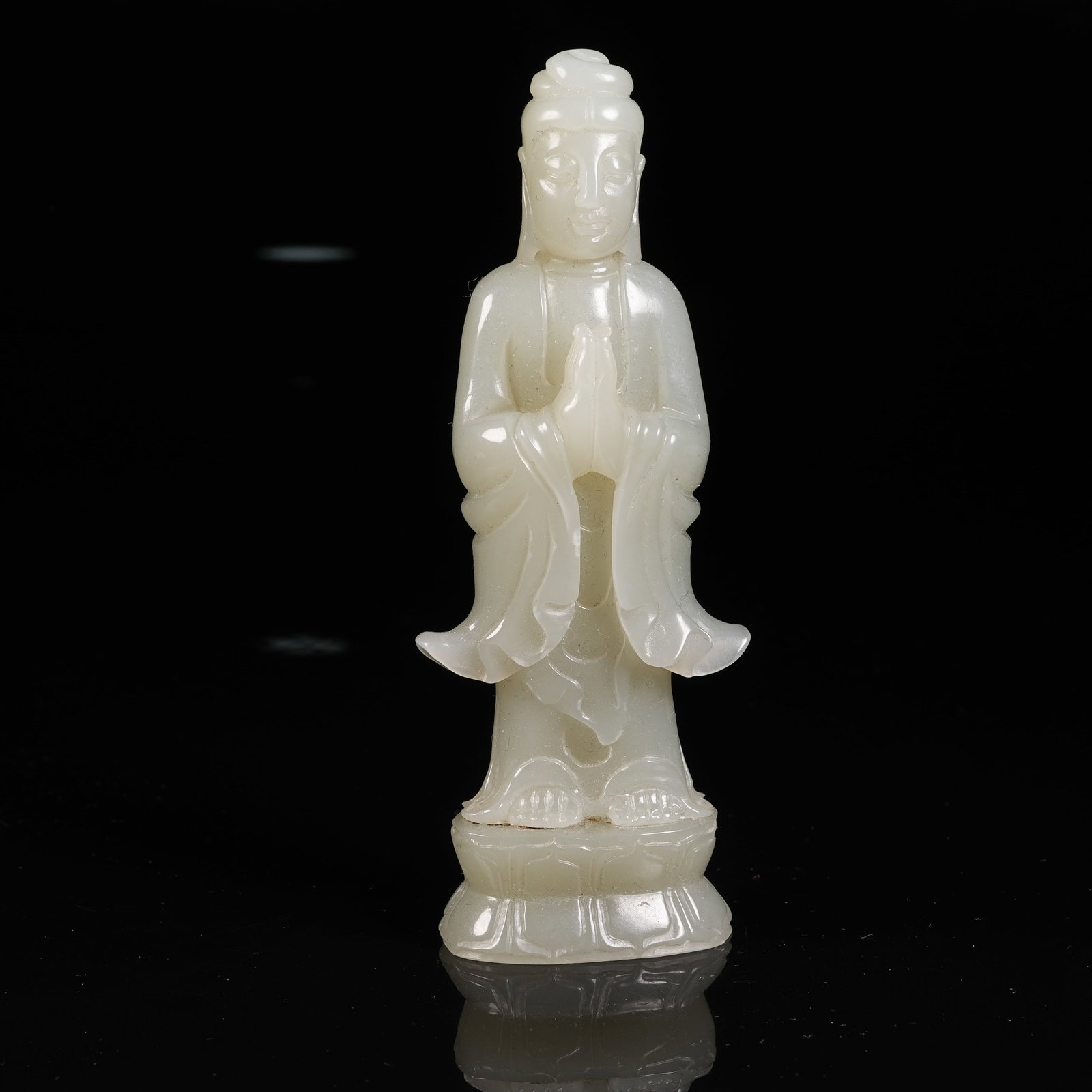 A HETIAN JADE STANDING BUDDHA STATUE (1 of 9)