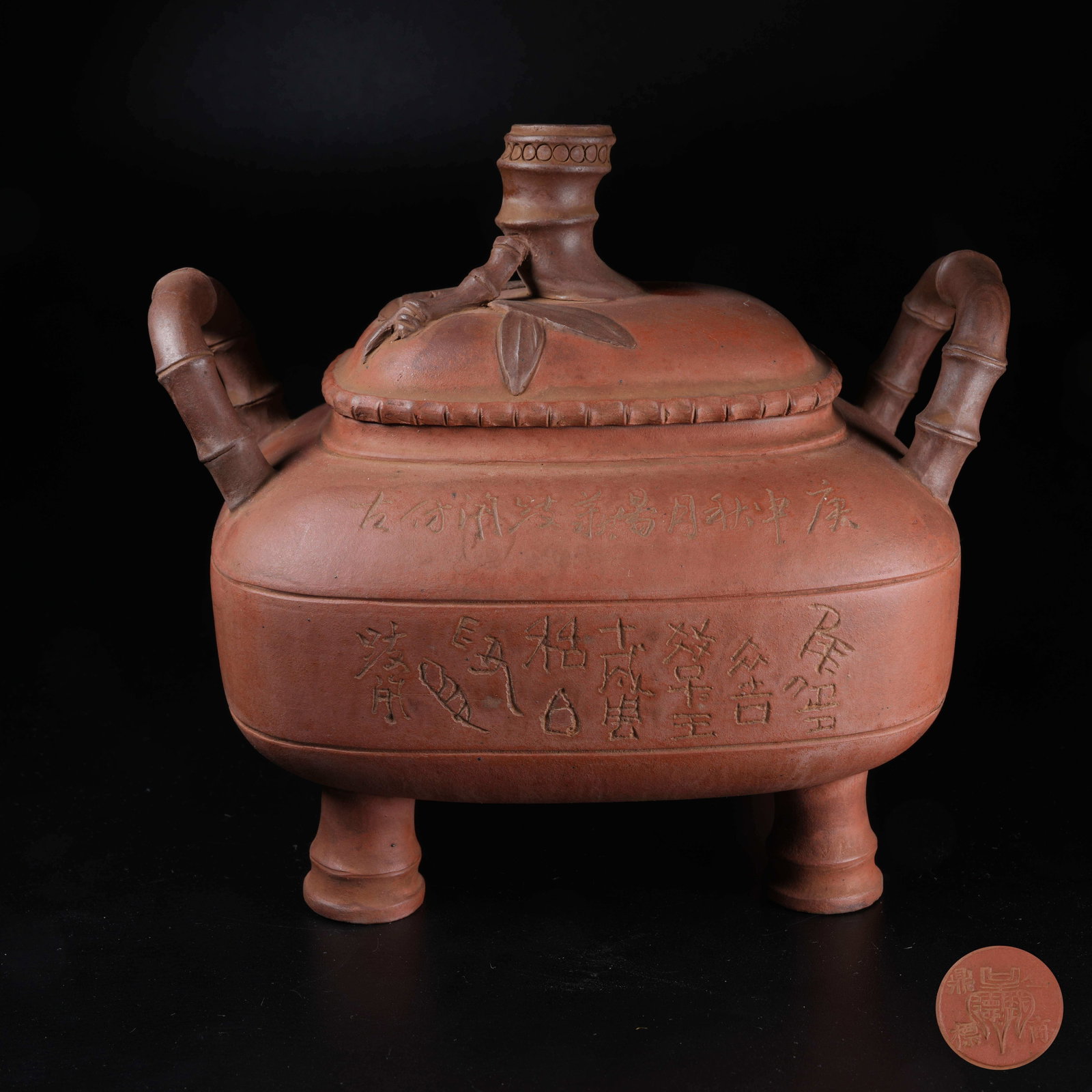 A YIXING ZISHA FOUR-LEGGED BAMBOO-EAR SMOKER: Yixing Zisha Four-legged Bamboo-ear Smoker