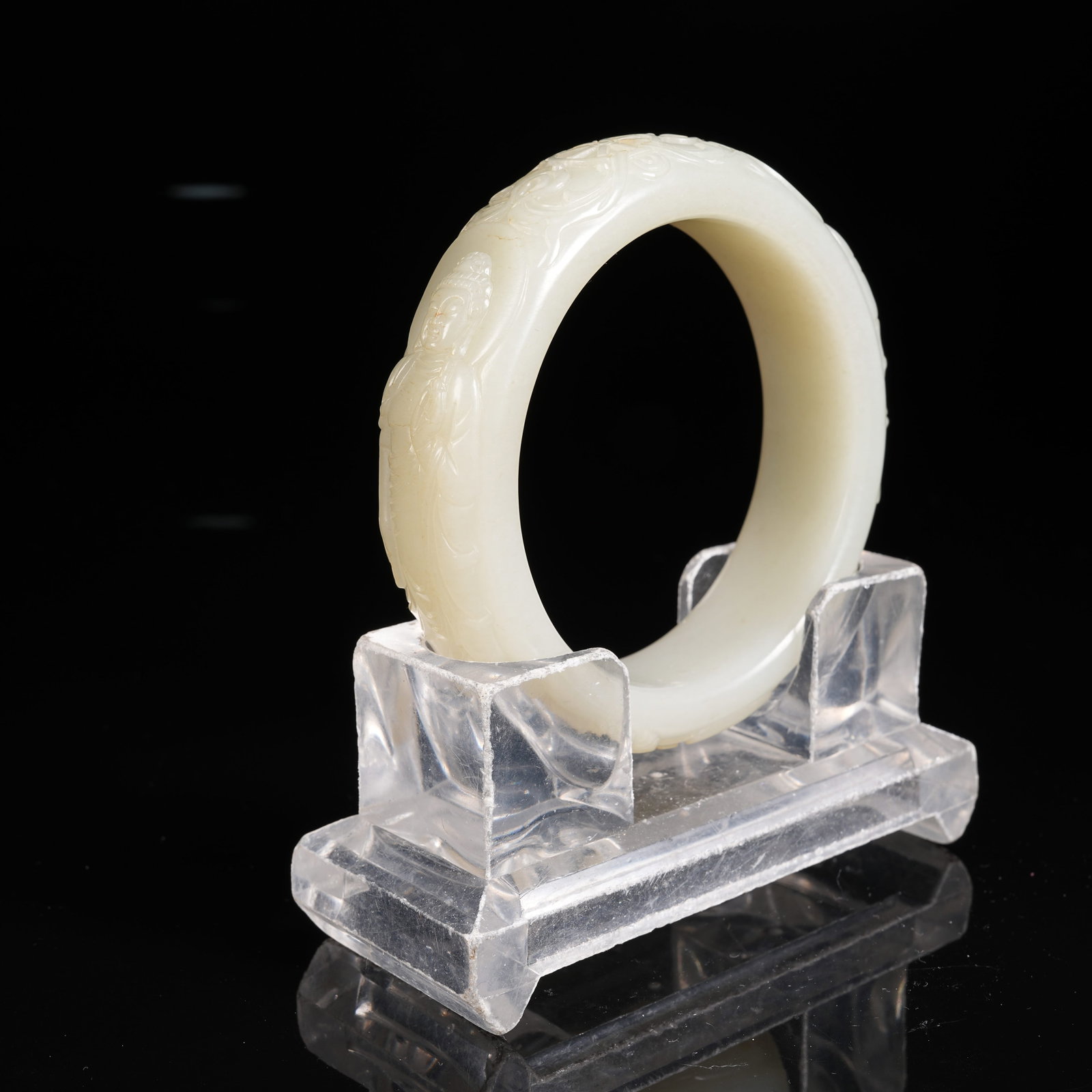 A HETIAN JADE BANGLE WITH BUDDHA PATTERN (1 of 10)