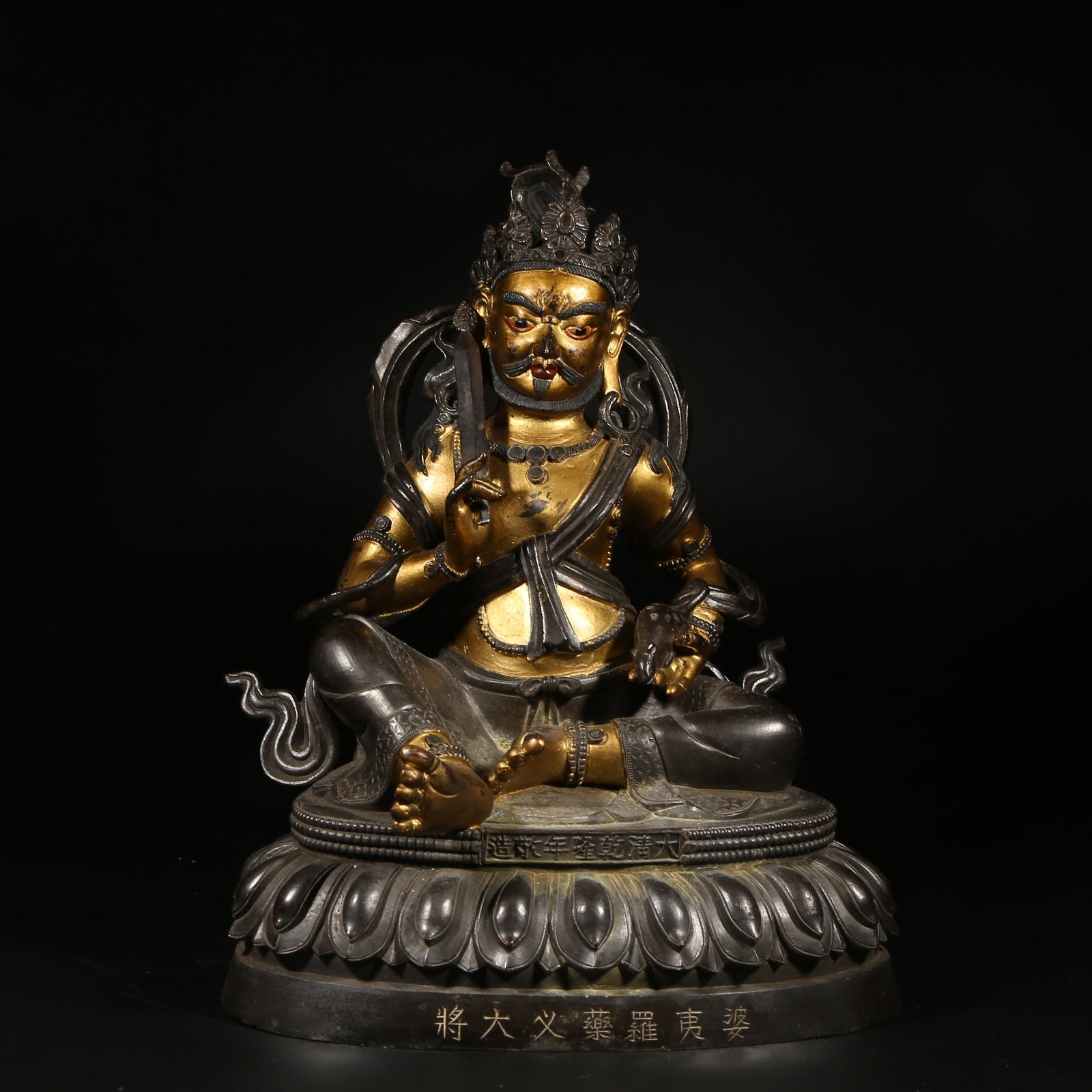 A BRONZE MUD-GILDED STATUE OF GENERAL P??CIKA (VAI?RAVA?A'S ATTENDANT): Bronze Mud-Gilded Statue of General P???cika (Vai?rava?a's Attendant)