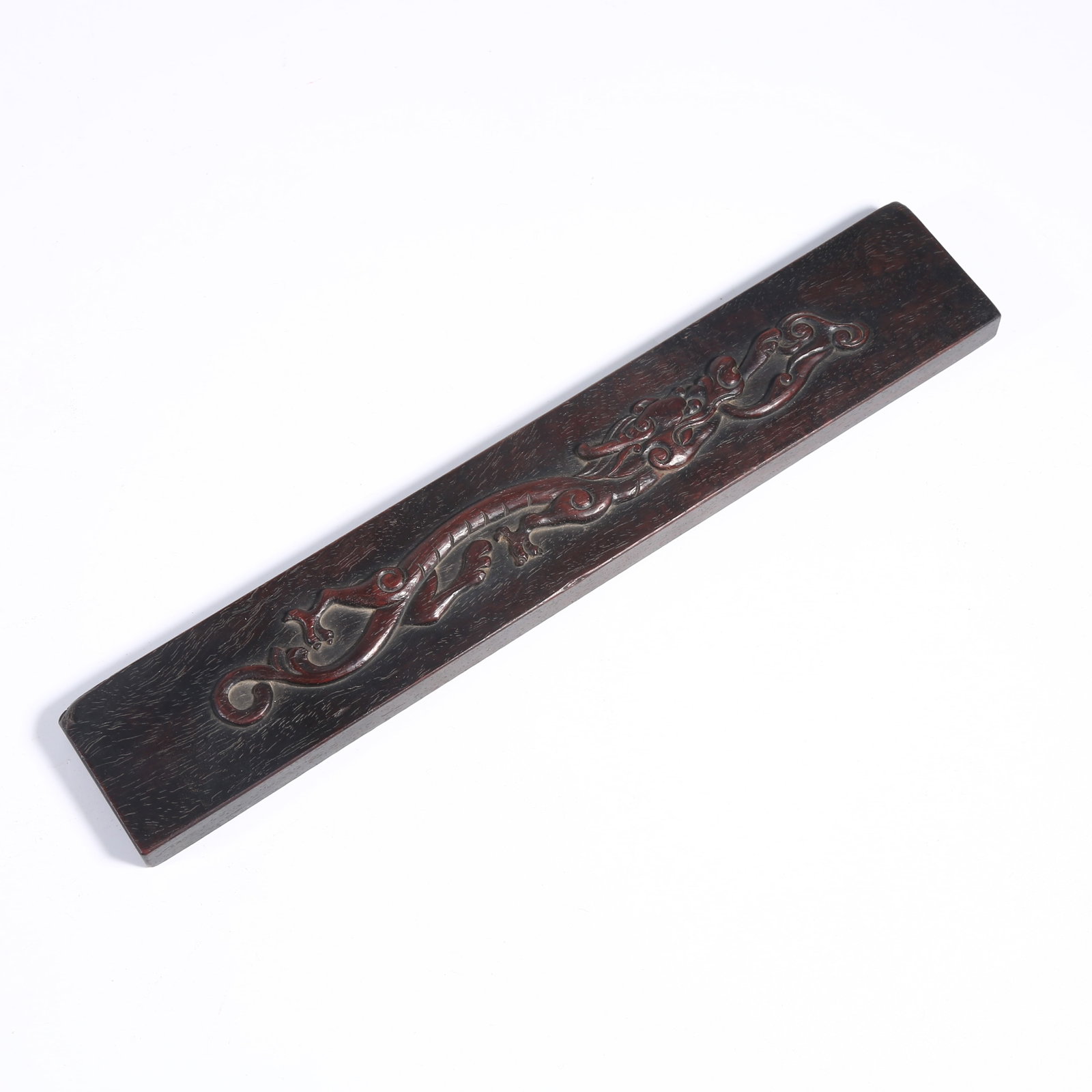 A ZITAN PAPERWEIGHT WITH DRAGON MOTIF (1 of 6)