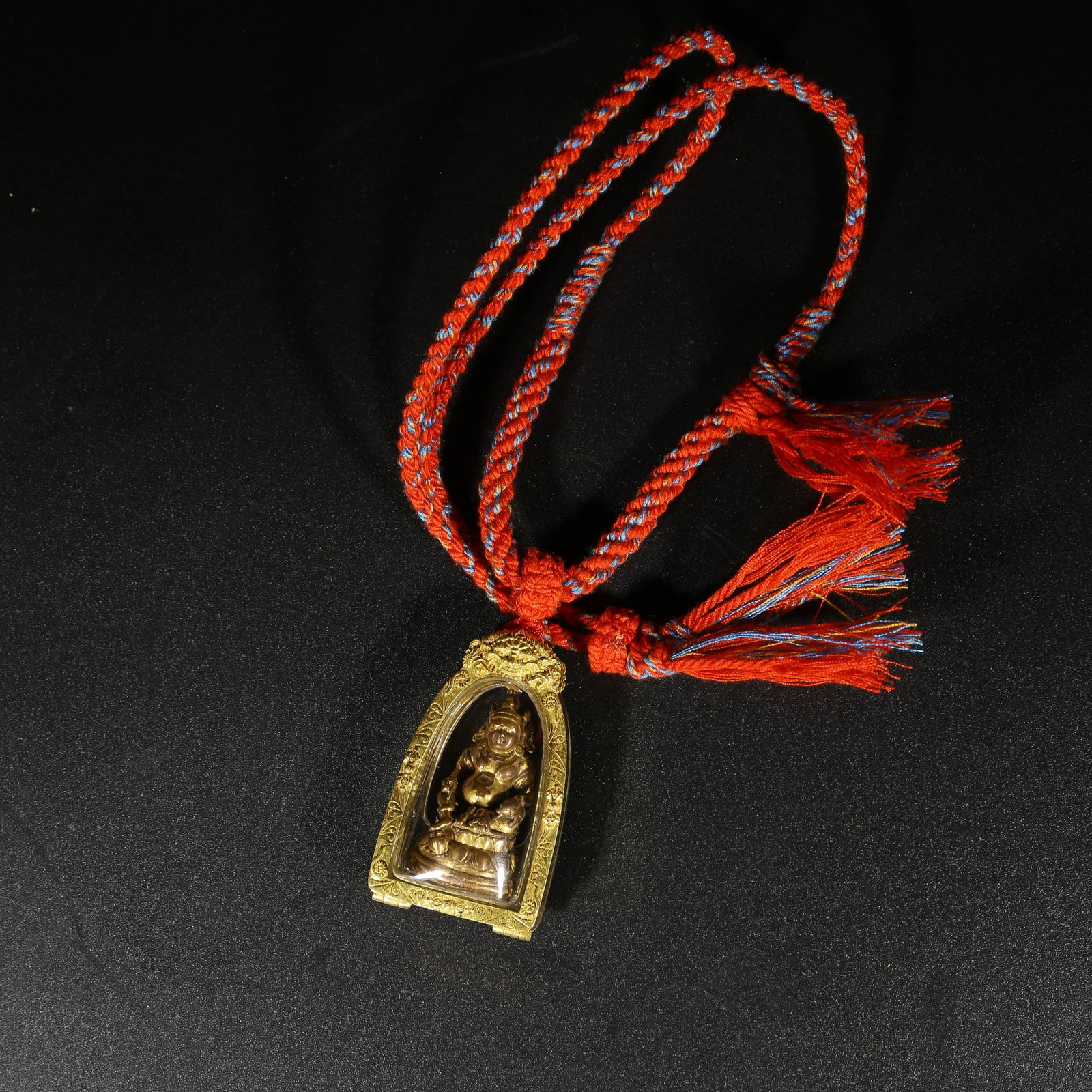 A GILT-BRONZE PORTABLE STATUE OF YELLOW JAMBHALA (1 of 7)