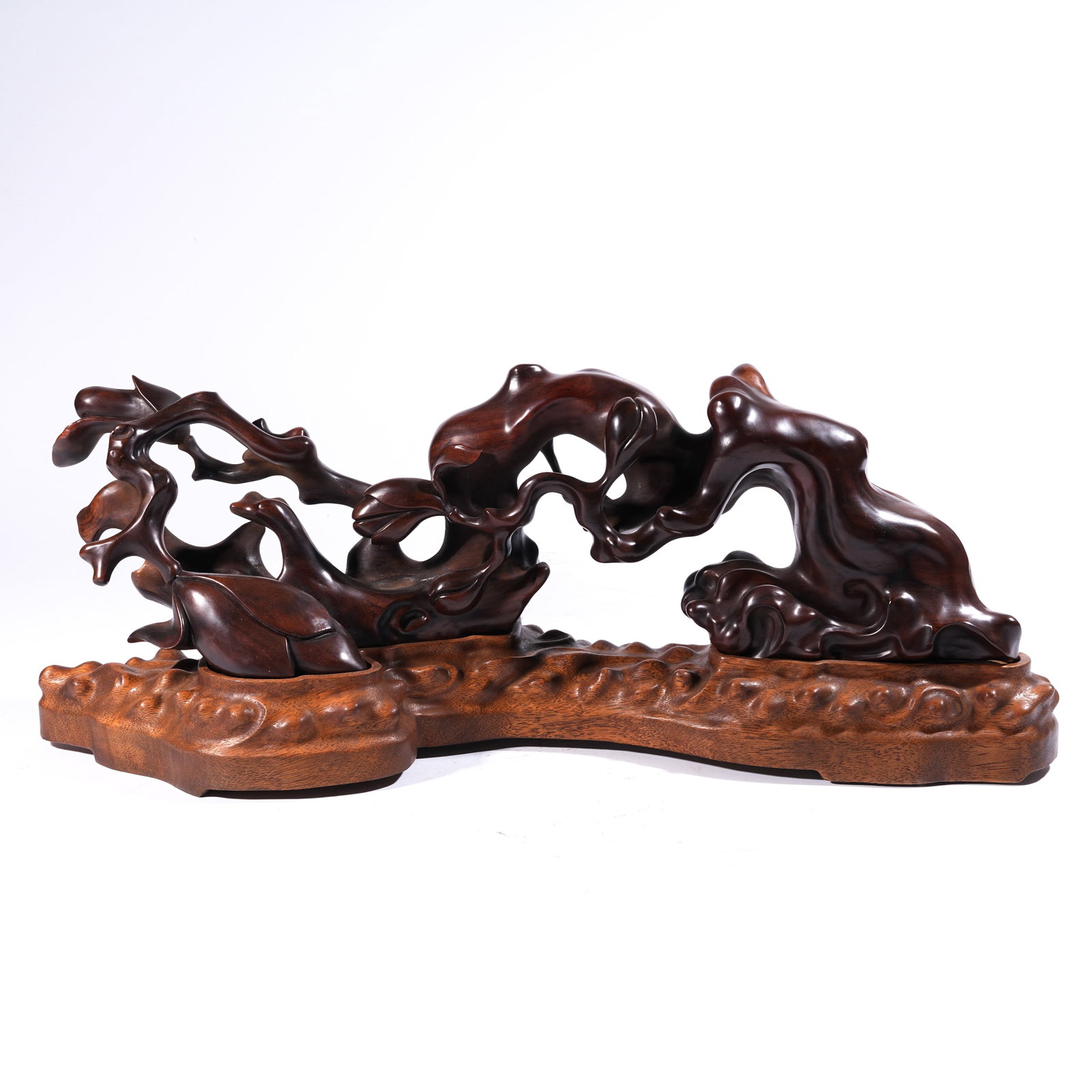 A MOUNTAIN-FORM ORNAMENT IN ZITAN WOOD: Mountain-Form Ornament in Zitan Wood