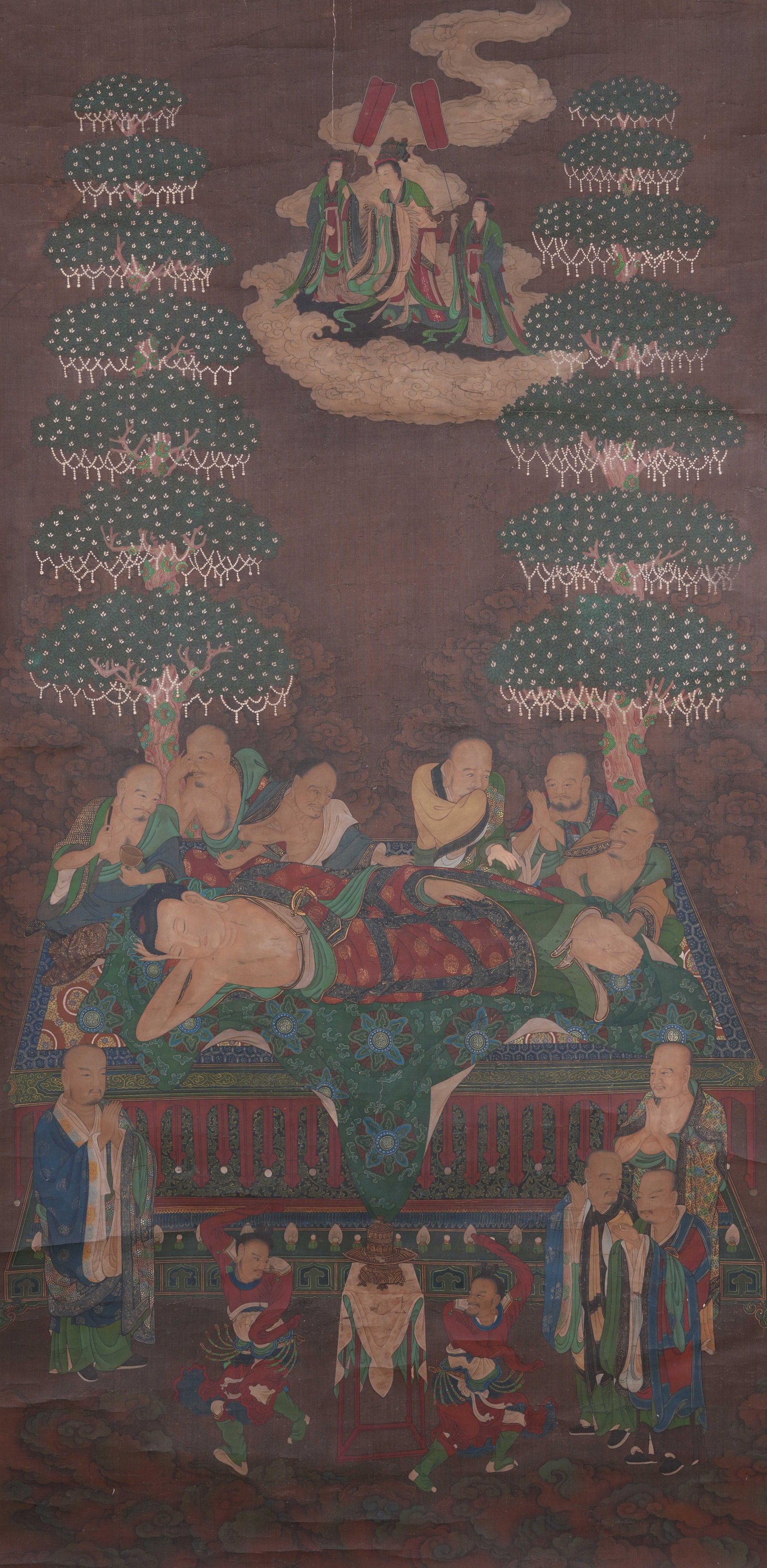 A SAKYAMUNI NIRVANA PAINTING ON SILK BY ANONYMOUS.: Sakyamuni Nirvana Painting on Silk by Anonymous.