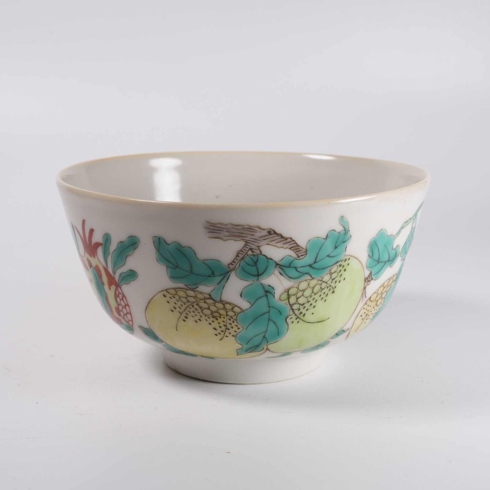 A RED AND GREEN COLOR BOWL WITH AUSPICIOUS FRUIT PATTERN: Red and Green Color Bowl with Auspicious Fruit Pattern