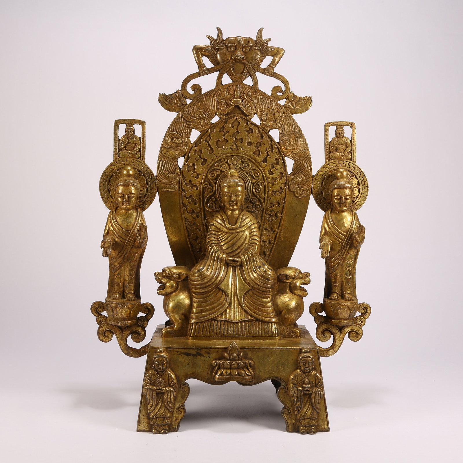 A GILT BRONZE FIGURE OF BUDDHA WITH TWO ATTENDANT FIGURES (1 of 9)