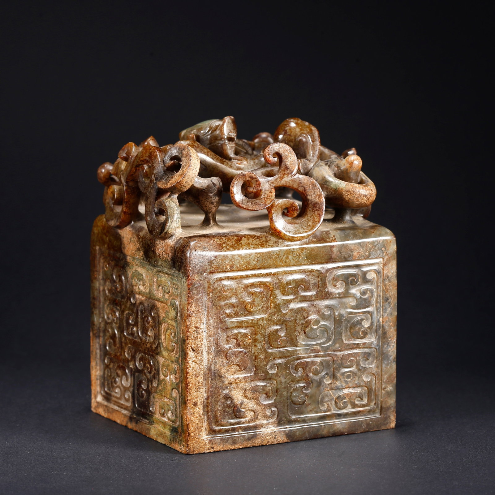 A HETIAN JADE DRAGON-HEAD SEAL: Hetian Jade Dragon-Head Seal