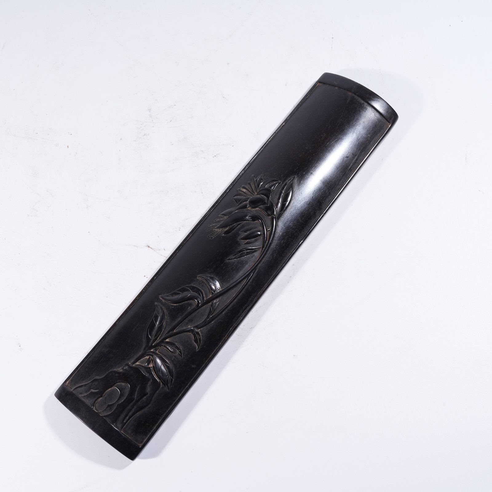 A ARMREST WITH FLORAL MOTIF IN ZITAN WOOD: Armrest with Floral Motif in Zitan Wood