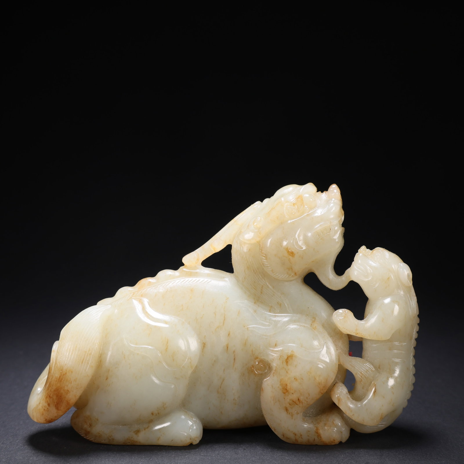 A HETIAN JADE PARENT-AND-CHILD BEAST (1 of 9)