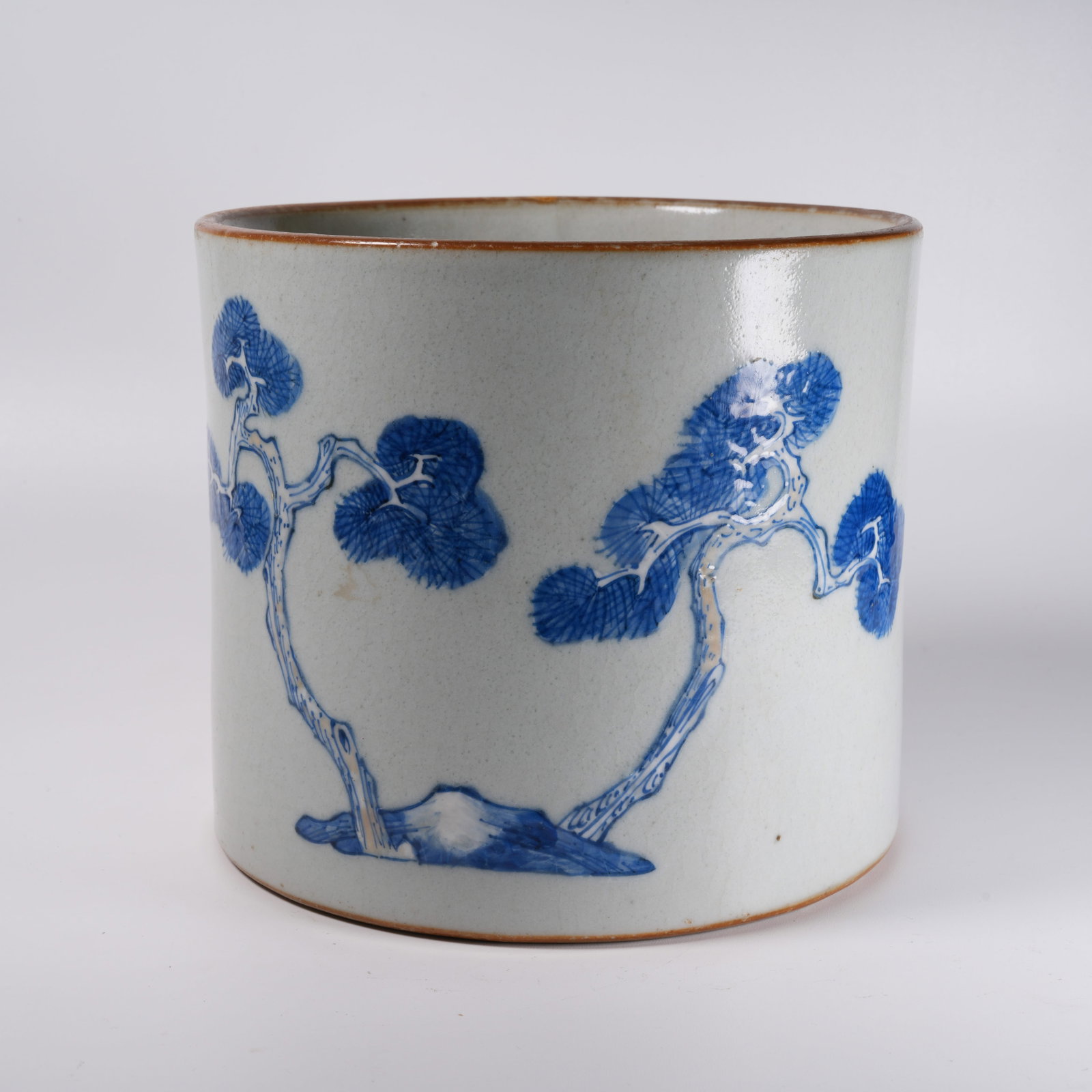 A BLUE AND WHITE BRUSH POT WITH PINE AND CRANE LONGEVITY PATTERN (1 of 9)