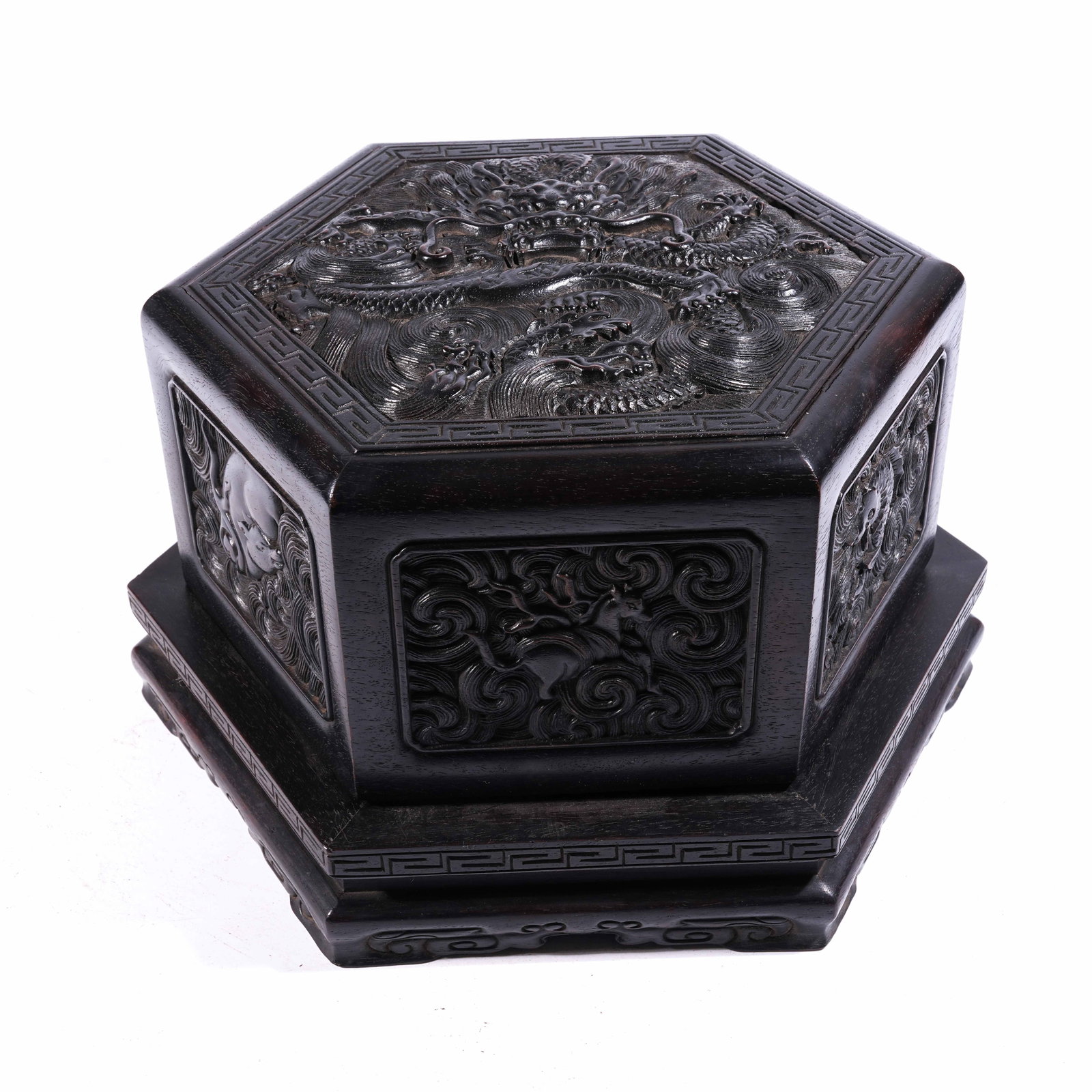 A HEXAGONAL COVERED BOX WITH CLOUD-AND-DRAGON MOTIF IN ZITAN WOOD: Hexagonal Covered Box with Cloud-and-Dragon Motif in Zitan Wood