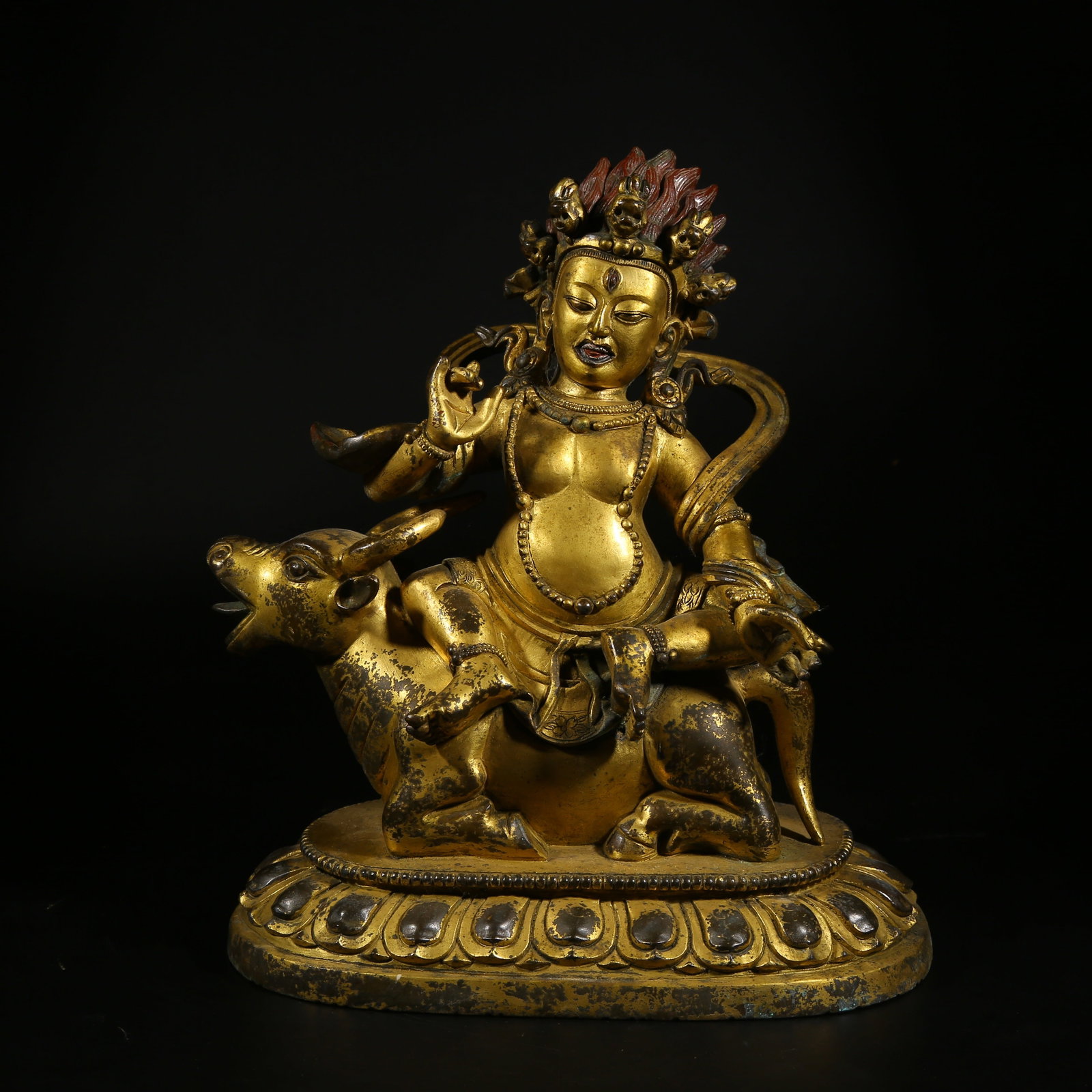 A GILDED COPPER STATUE OF A DHARMA PROTECTOR: Gilded Copper Statue of a Dharma Protector