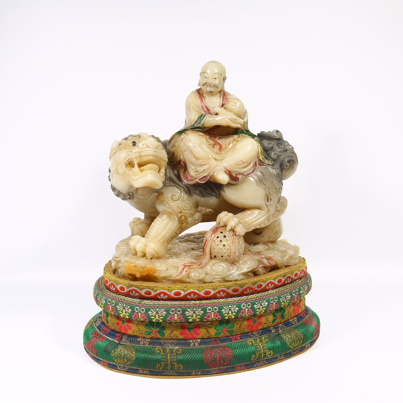 A SHOUSHAN FURONG STONE POLYCHROME ARHAT ORNAMENT: Shoushan Furong stone polychrome Arhat ornament
