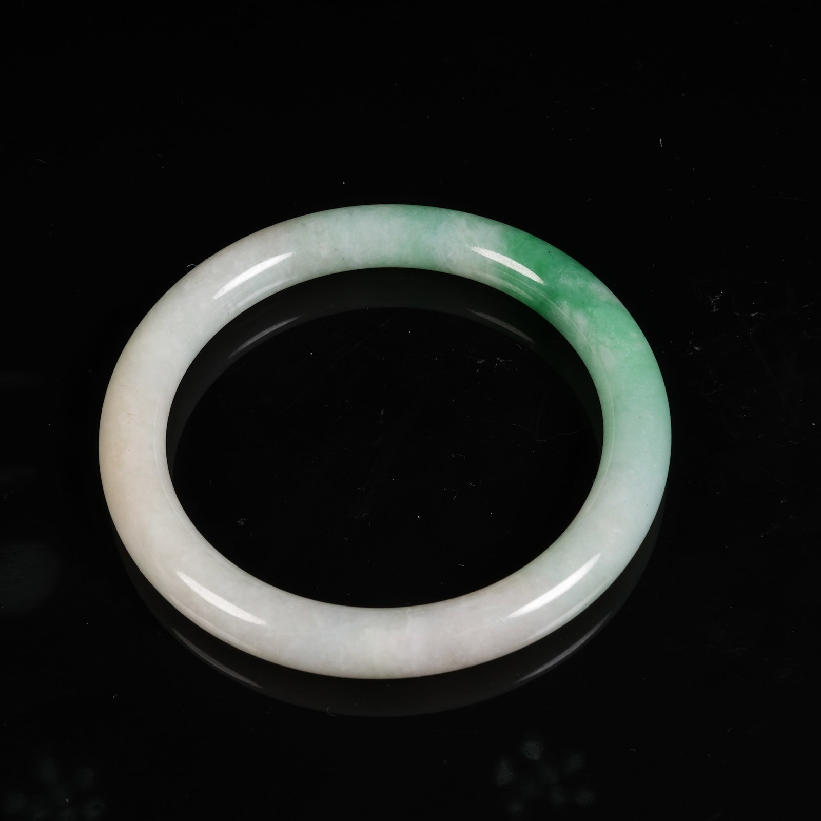 A JADEITE CIRCULAR RING - 10