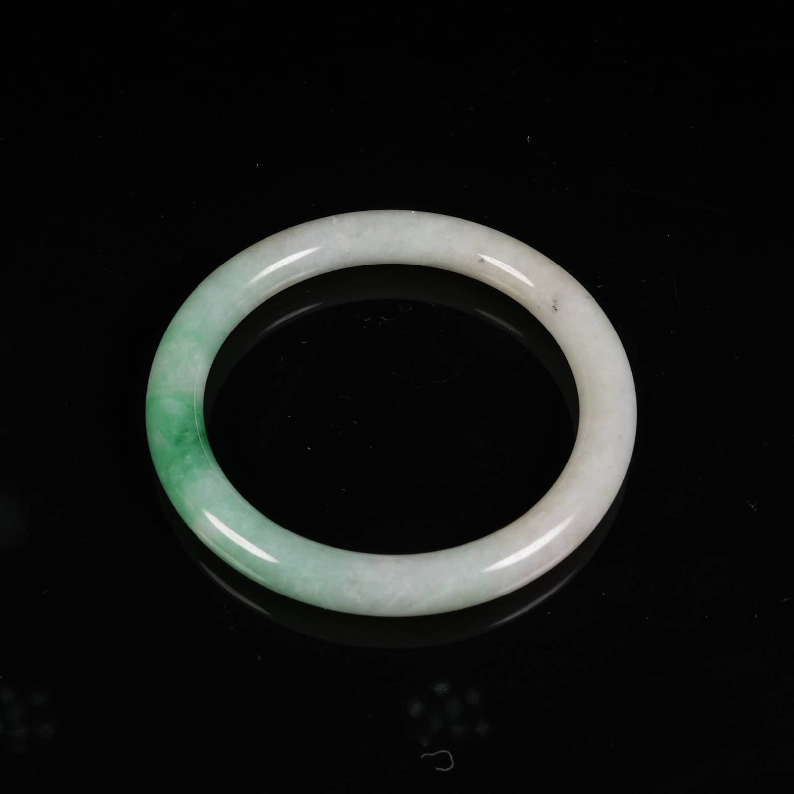 A JADEITE CIRCULAR RING (1 of 10)