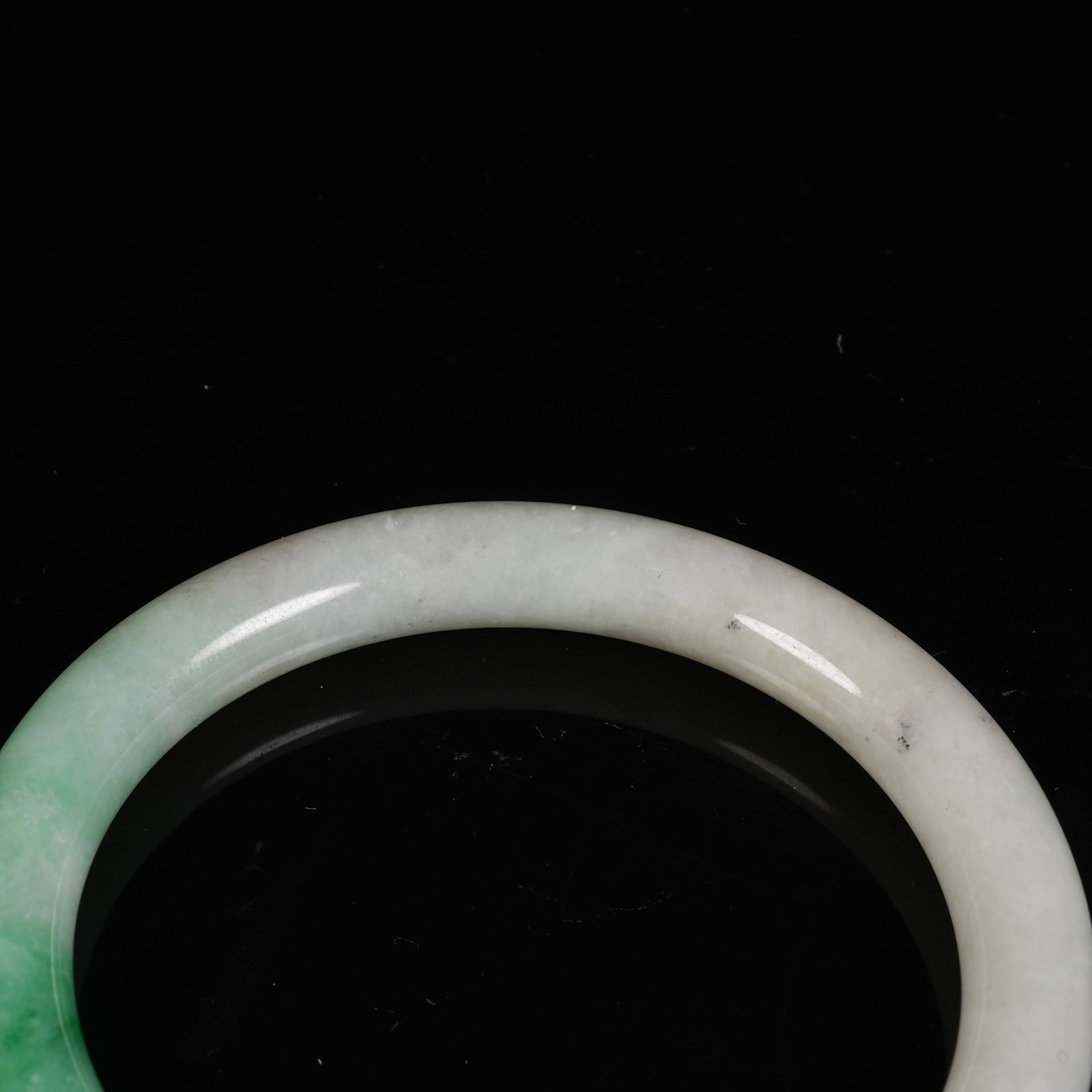 A JADEITE CIRCULAR RING - 3