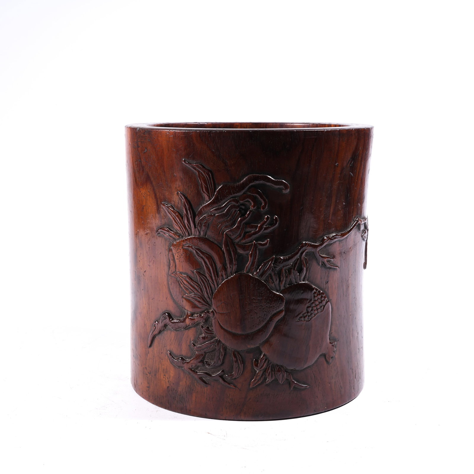 A BRUSH POT IN HUANGHUALI WOOD WITH AUSPICIOUS FRUIT MOTIF: Brush Pot in Huanghuali Wood with Auspicious Fruit Motif