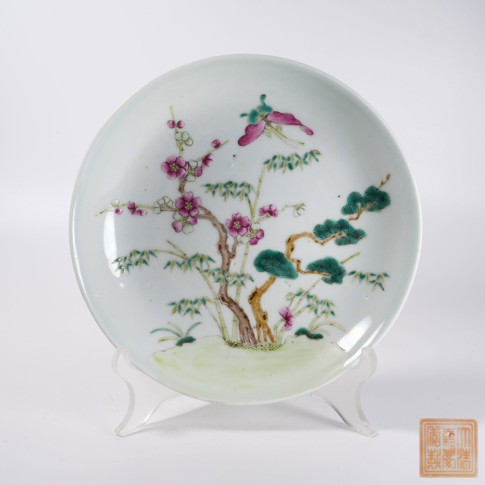 A FAMILLE ROSE PLATE WITH THREE FRIENDS OF WINTER PATTERN: Famille Rose Plate with Three Friends of Winter Pattern