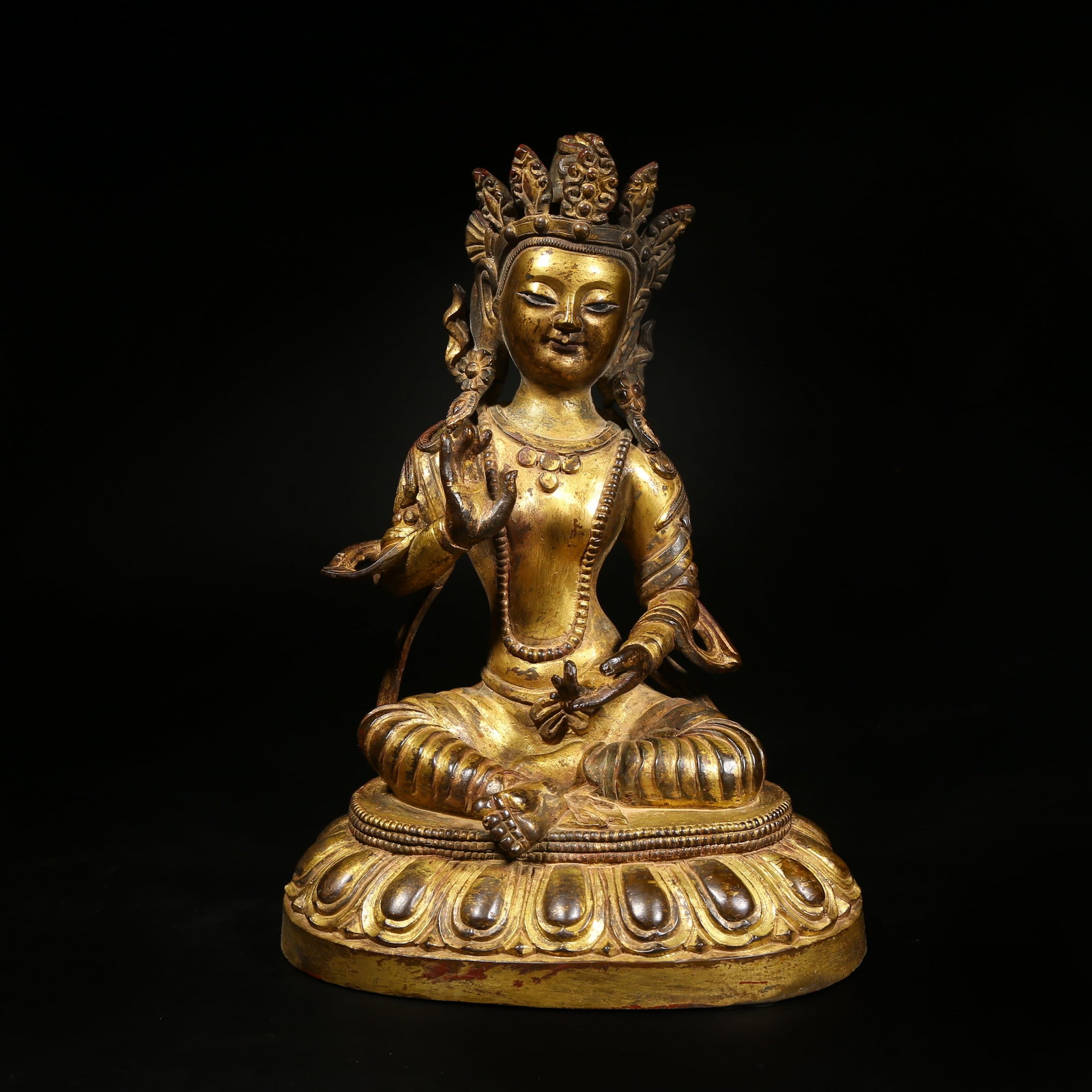 A GILDED BRONZE STATUE OF AVALOKITESHVARA: Gilded Bronze Statue of Avalokiteshvara