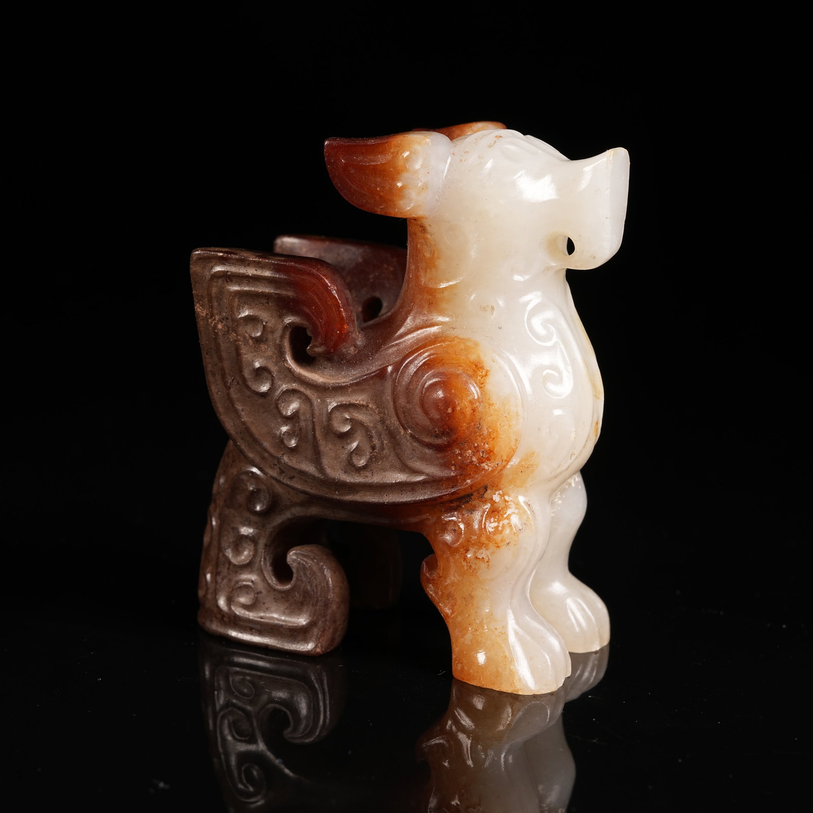 A ANCIENT JADE AUSPICIOUS BEAST ORNAMENT (1 of 8)