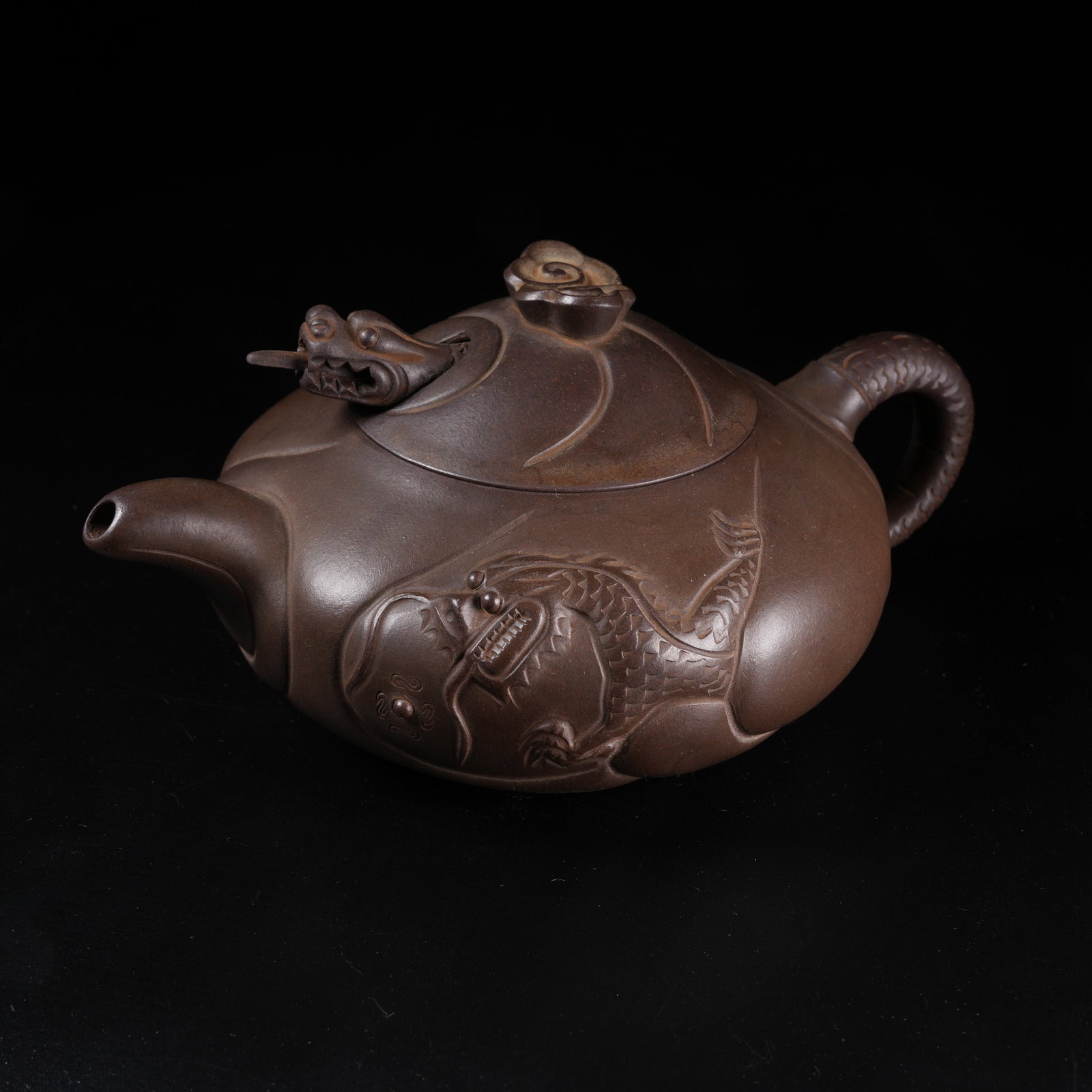 A YIXING ZISHA EWER WITH DRAGON PATTERN: Yixing Zisha Ewer with Dragon Pattern
