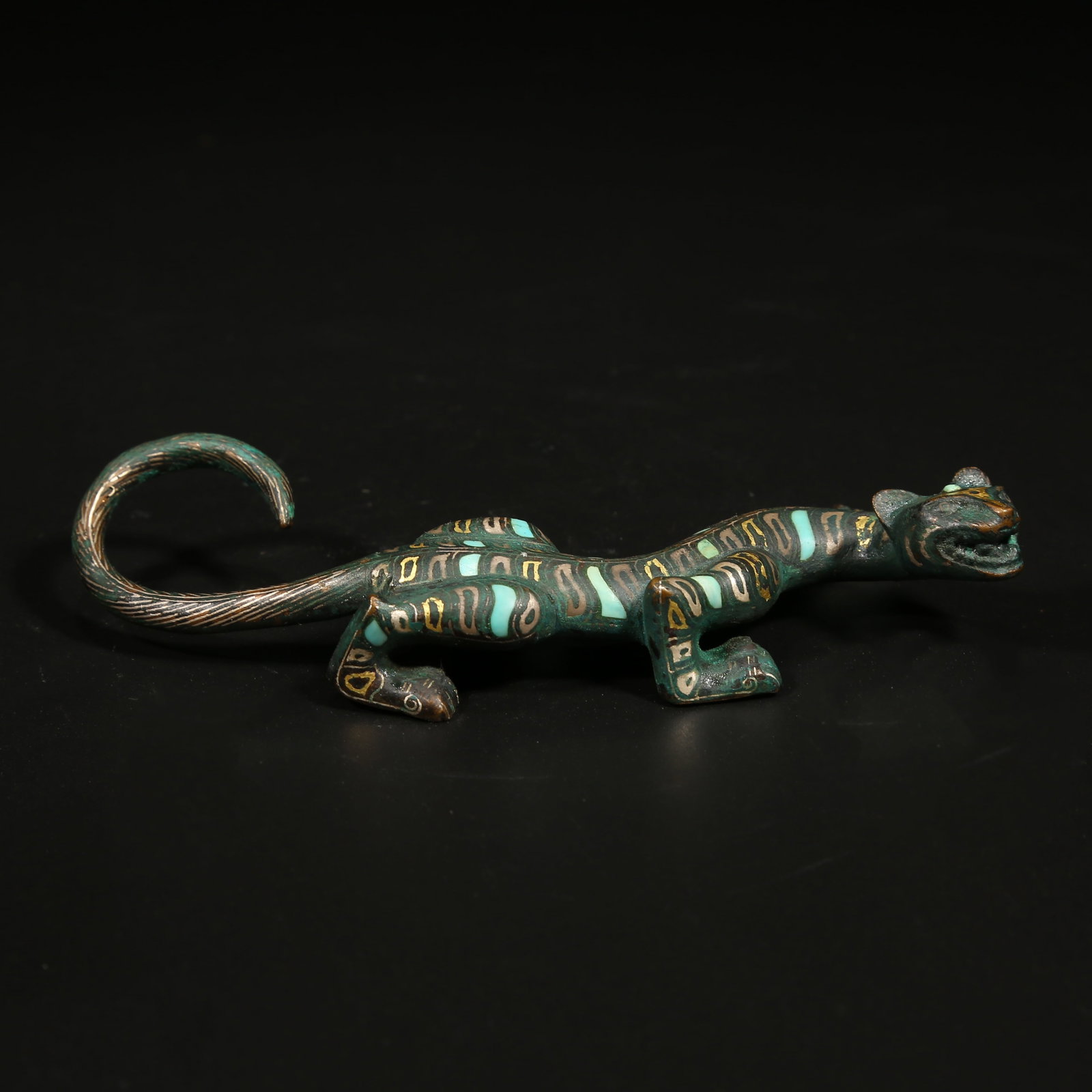 A GILT AND SILVER INLAID BRONZE CHI TIGER ORNAMENT: Gilt and Silver Inlaid Bronze Chi Tiger Ornament