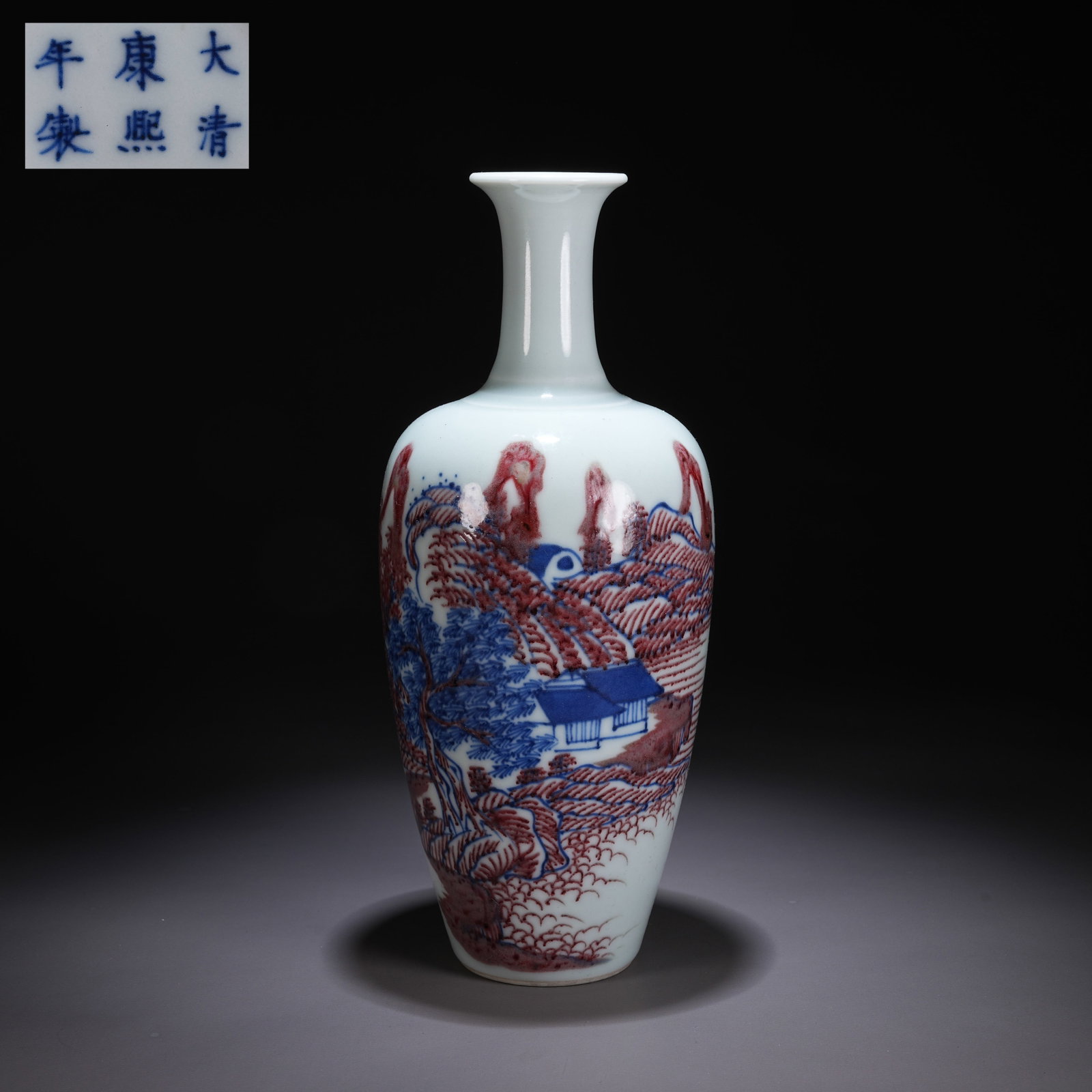 A BLUE-AND-WHITE AND UNDERGLAZE RED LANDSCAPE VASE: Blue-and-White and Underglaze Red Landscape Vase