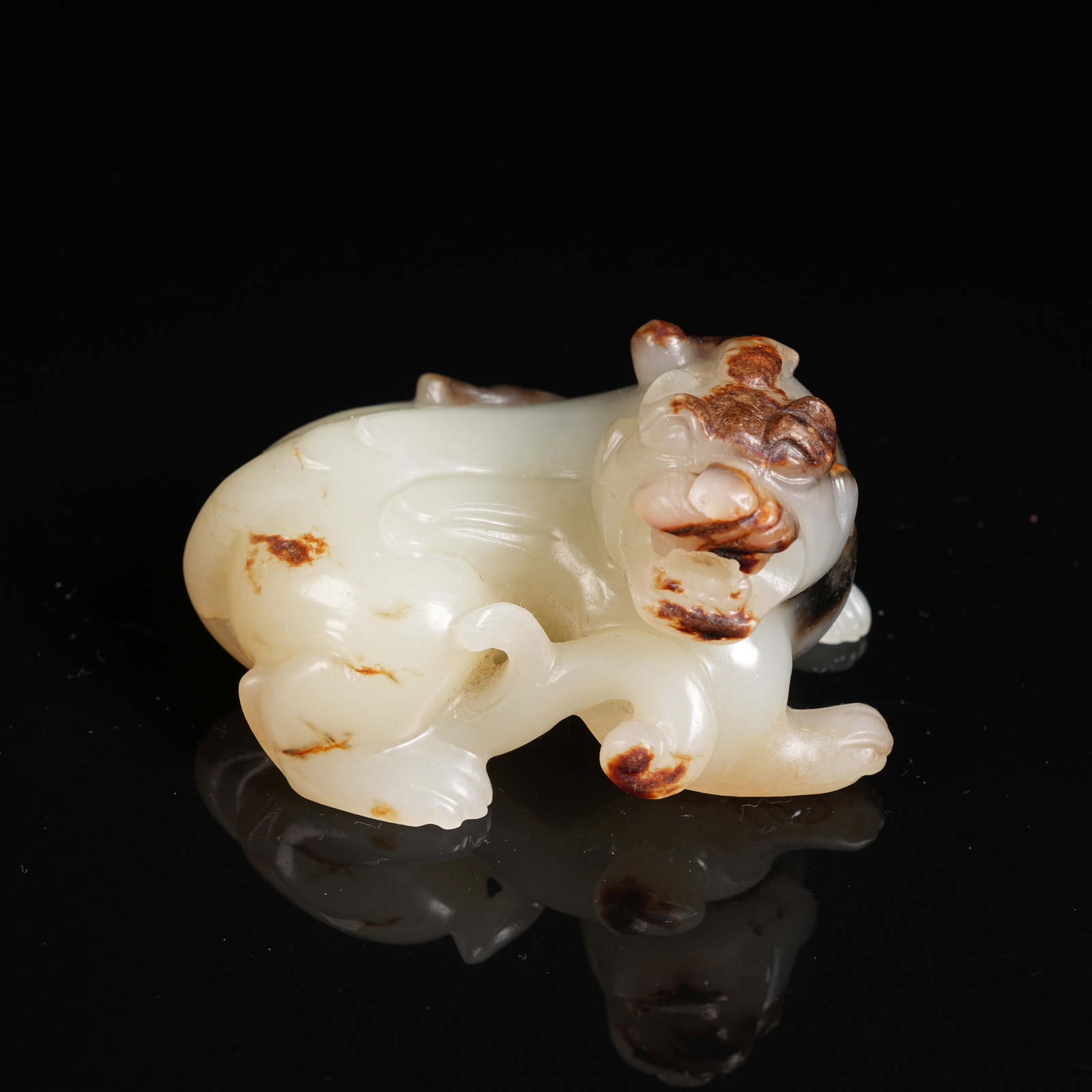 A ANCIENT JADE RECLINING BEAST ORNAMENT: Ancient Jade Reclining Beast Ornament