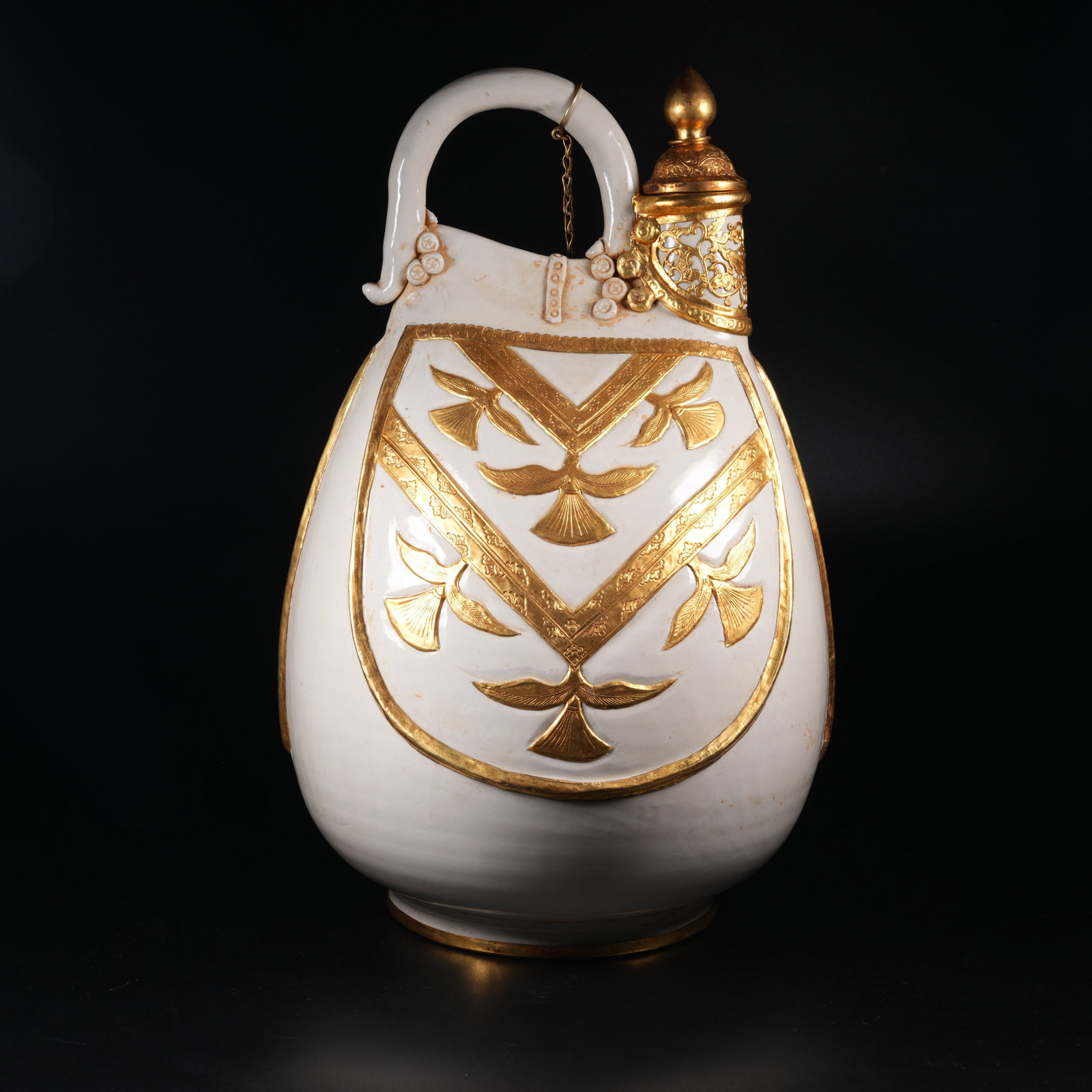 A DING KILN LEATHER POUCH POT WITH BIRD PATTERN (1 of 9)
