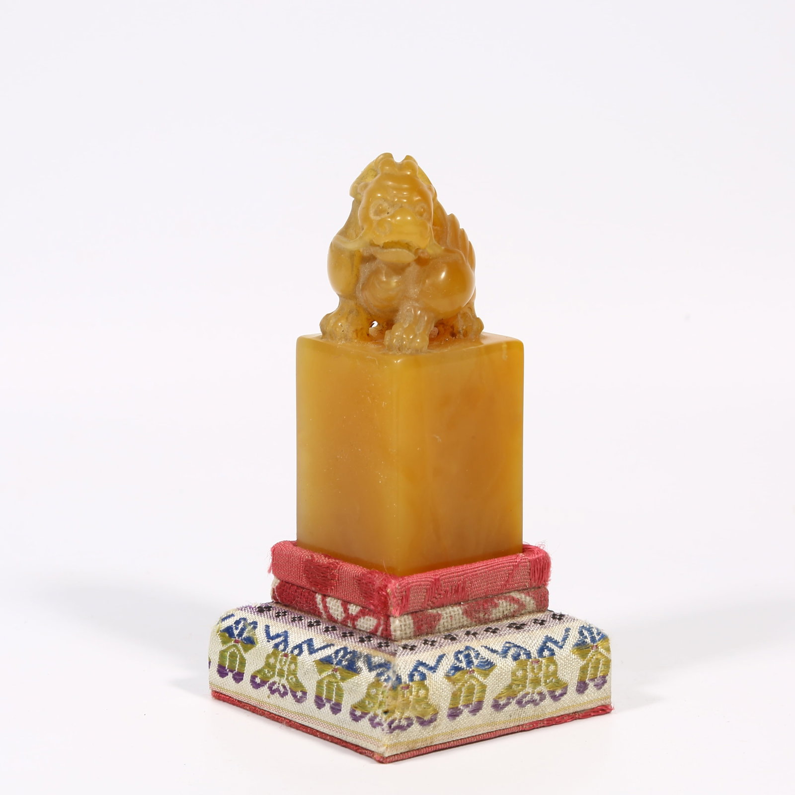 A SHOUSHAN TIANHUANG STONE SEAL WITH BEAST-SHAPED KNOB: Shoushan Tianhuang stone seal with beast-shaped knob