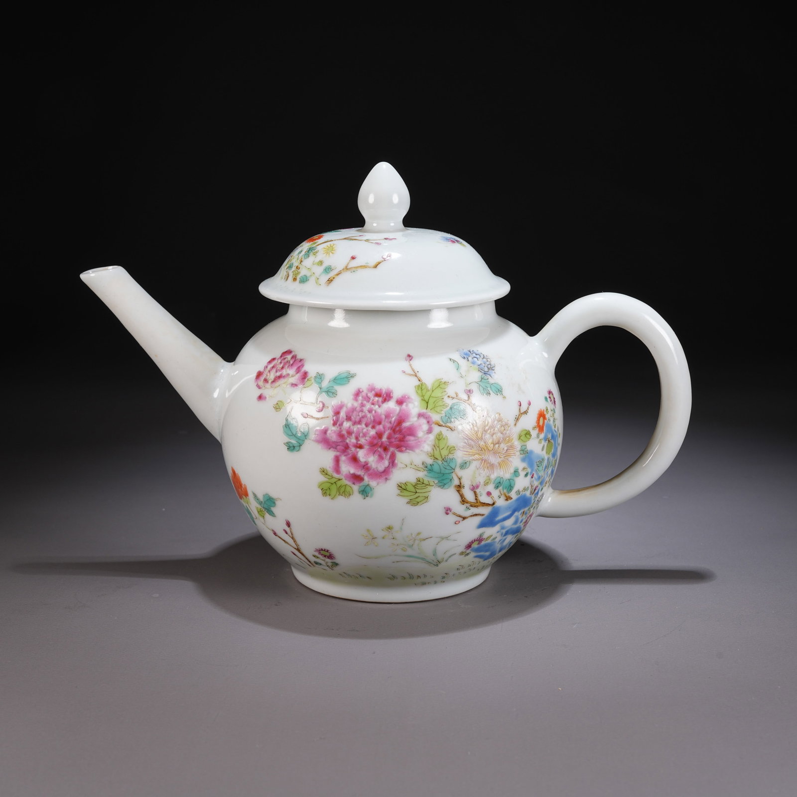 A FAMILLE ROSE EWER WITH FLOWER-AND-BUTTERFLY MOTIFS: Famille Rose Ewer with Flower-and-Butterfly Motifs