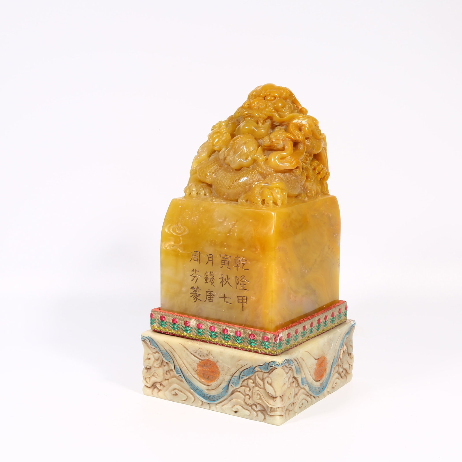 A SHOUSHAN TIANHUANG STONE SEAL WITH DRAGON-SHAPED KNOB: Shoushan Tianhuang stone seal with dragon-shaped knob
