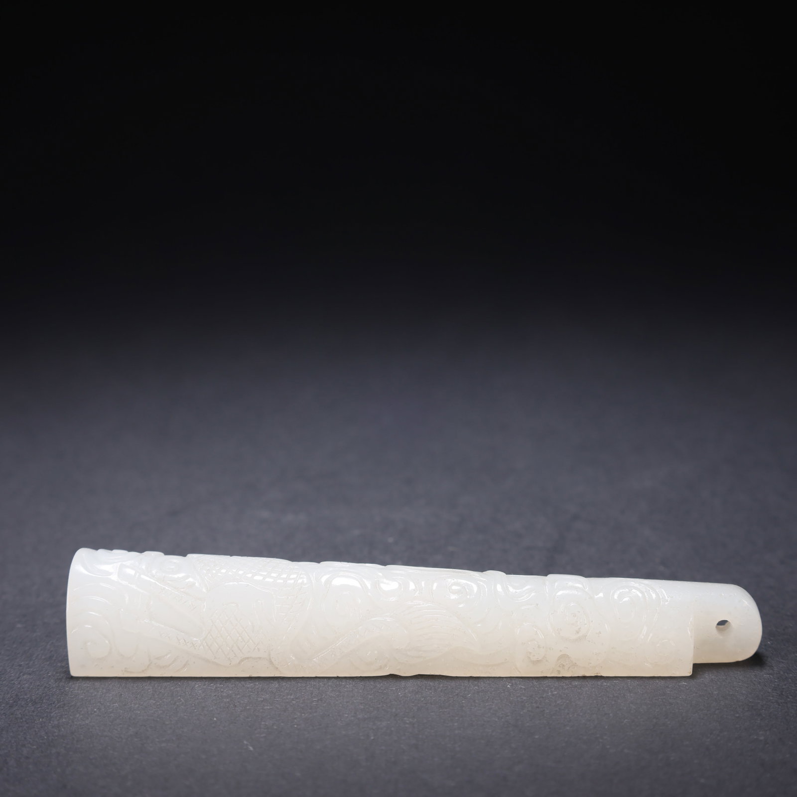 A HETIAN JADE DRAGON-PATTERN JADE FEATHER ORNAMENT (1 of 9)
