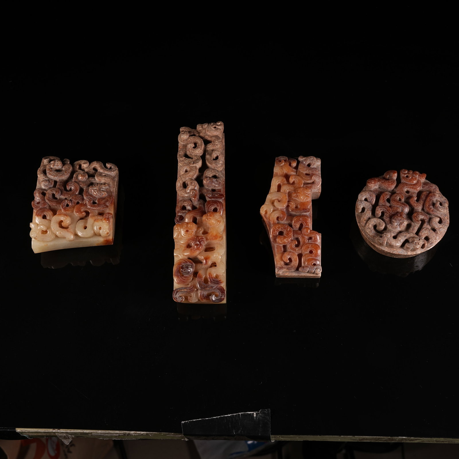 A SET OF ANCIENT JADE SWORD ORNAMENTS WITH CHILONG PATTERN: Set of Ancient Jade Sword Ornaments with Chilong Pattern