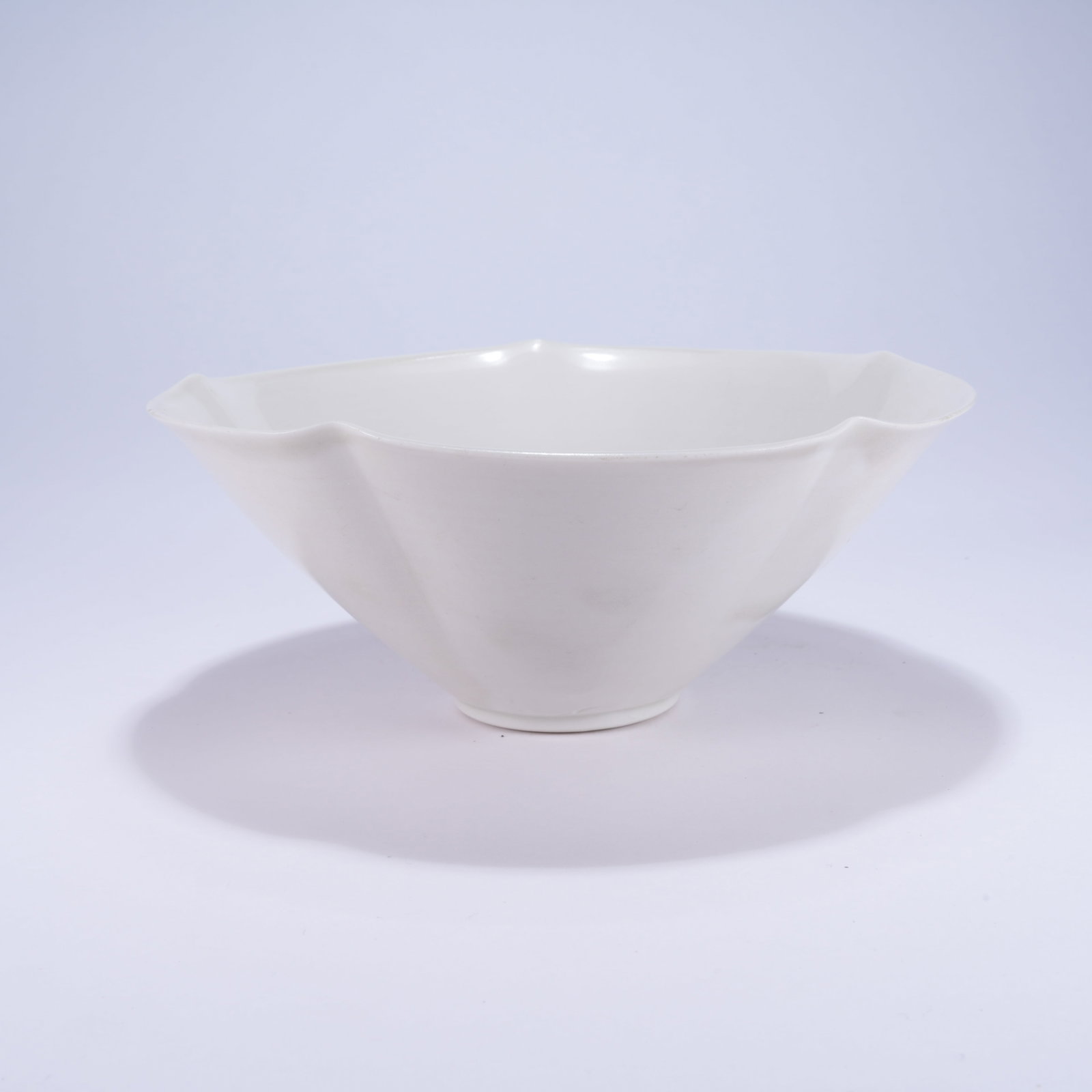 A DING KILN FLOWER-RIMMED BOWL (1 of 9)