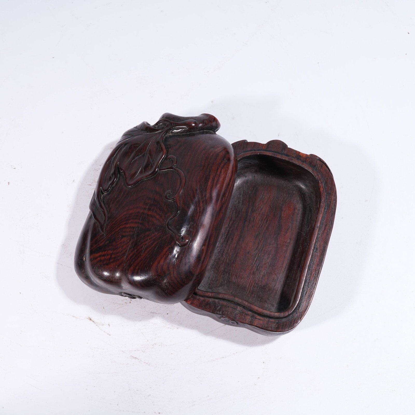 A COVERED BOX IN HUANGHUALI WOOD IN THE FORM OF AUSPICIOUS FRUIT (1 of 9)