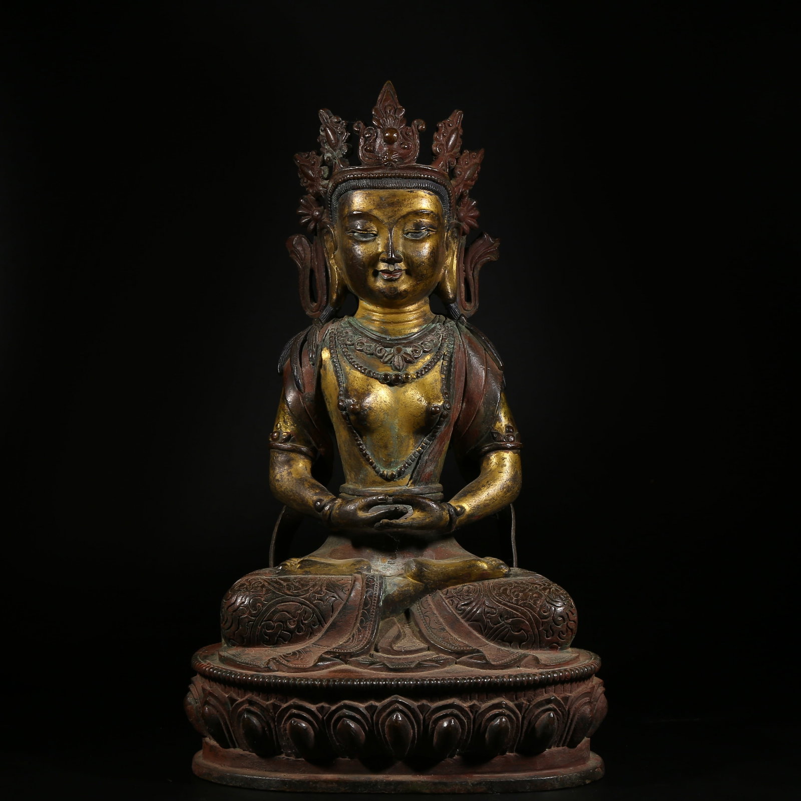 A PARTIALLY GILDED BRONZE STATUE OF AVALOKITESHVARA: Partially Gilded Bronze Statue of Avalokiteshvara