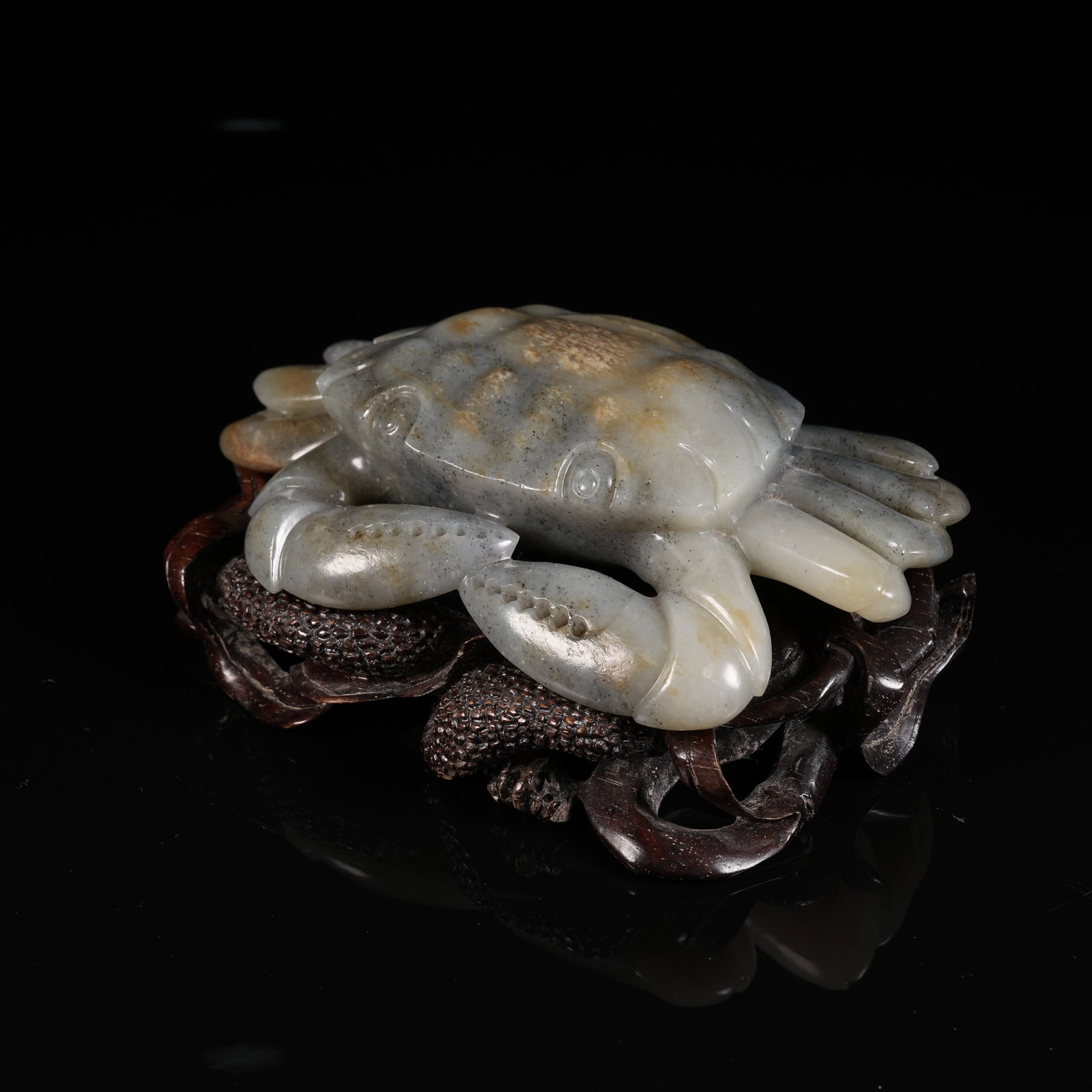 A HETIAN JADE BLUE AND WHITE SEED MATERIAL WEALTH FROM ALL DIRECTIONS ORNAMENT: Hetian Jade Blue and White Seed Material Wealth from All Directions Ornament