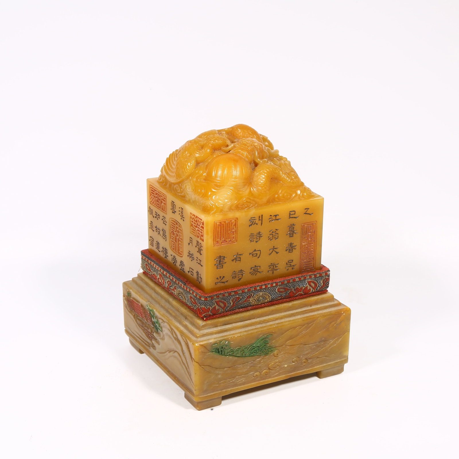 A SHOUSHAN TIANHUANG STONE SEAL WITH DRAGON-AND-PHOENIX-SHAPED KNOB: Shoushan Tianhuang stone seal with dragon-and-phoenix-shaped knob