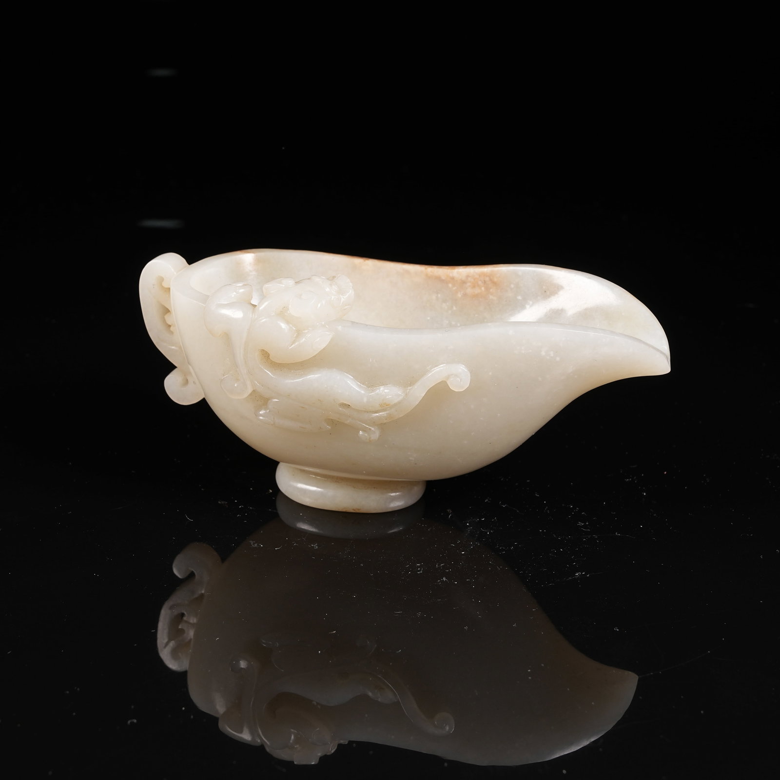 A ANCIENT JADE HORN CUP WITH FLOOD DRAGON PATTERN: Ancient Jade Horn Cup with Flood Dragon Pattern