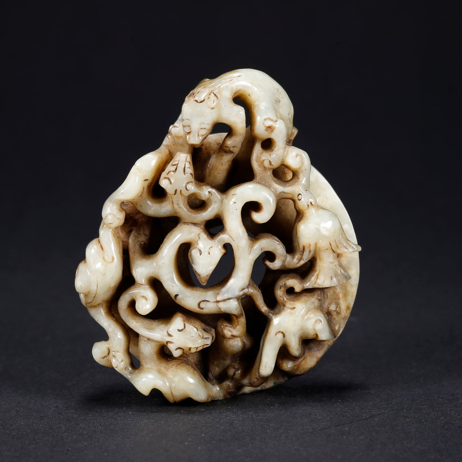 A HETIAN JADE BI DISC WITH DRAGON AND PHOENIX MOTIF (1 of 10)