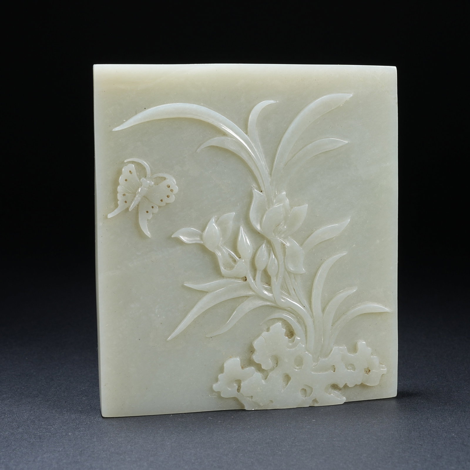 A HETIAN JADE SQUARE PLAQUE WITH FLOWER AND BUTTERFLY PATTERN: Hetian Jade Square Plaque with Flower and Butterfly Pattern