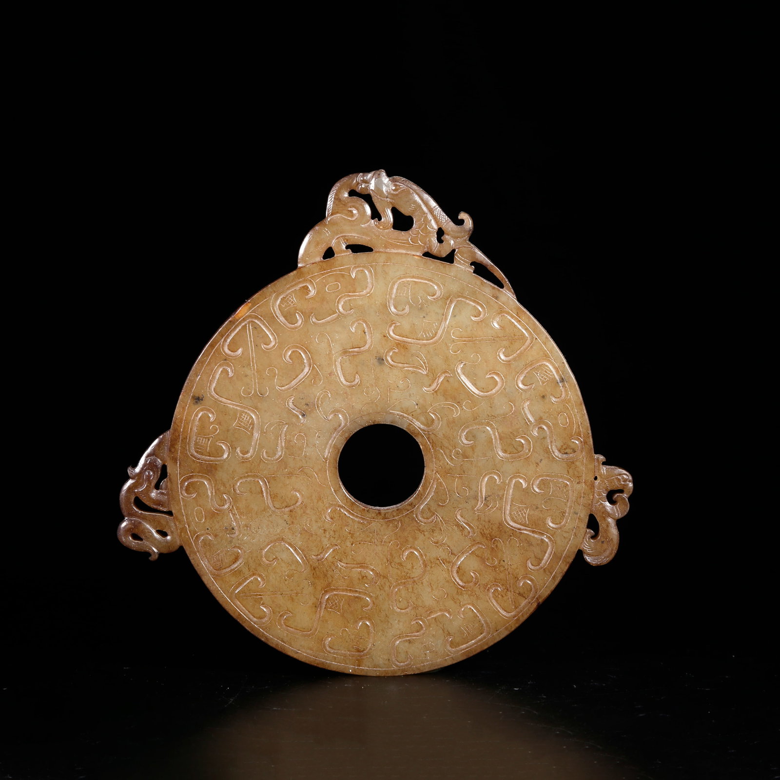 A ANCIENT JADE BI DISC WITH OUTER CARVINGS (1 of 9)