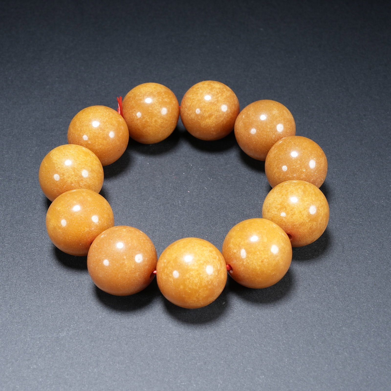 A HETIAN YELLOW JADE BRACELET: Hetian Yellow Jade Bracelet